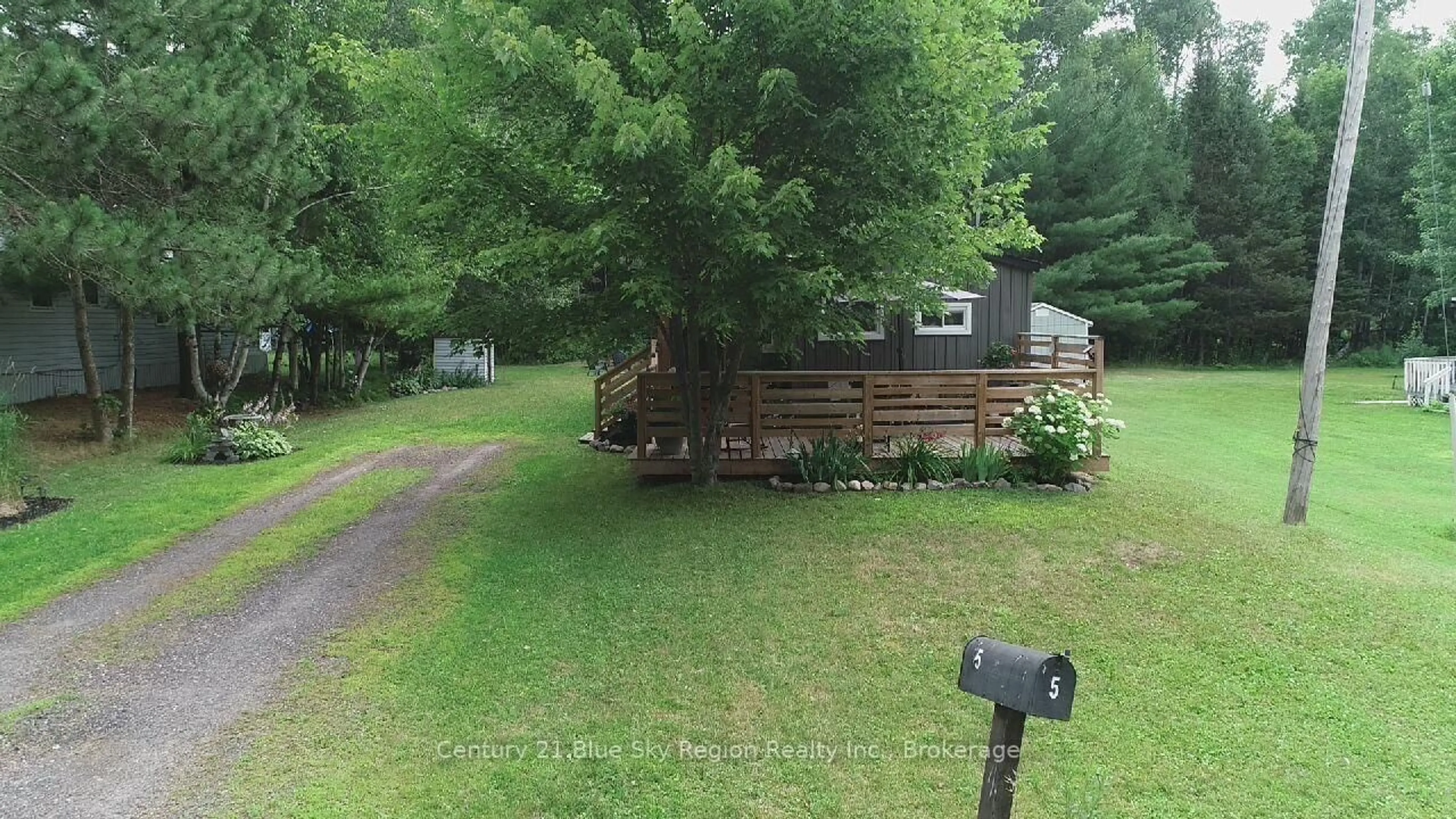 A pic from outside/outdoor area/front of a property/back of a property/a pic from drone, unknown for 128 Rivers Rd #5, Callander Ontario P0H 1H0