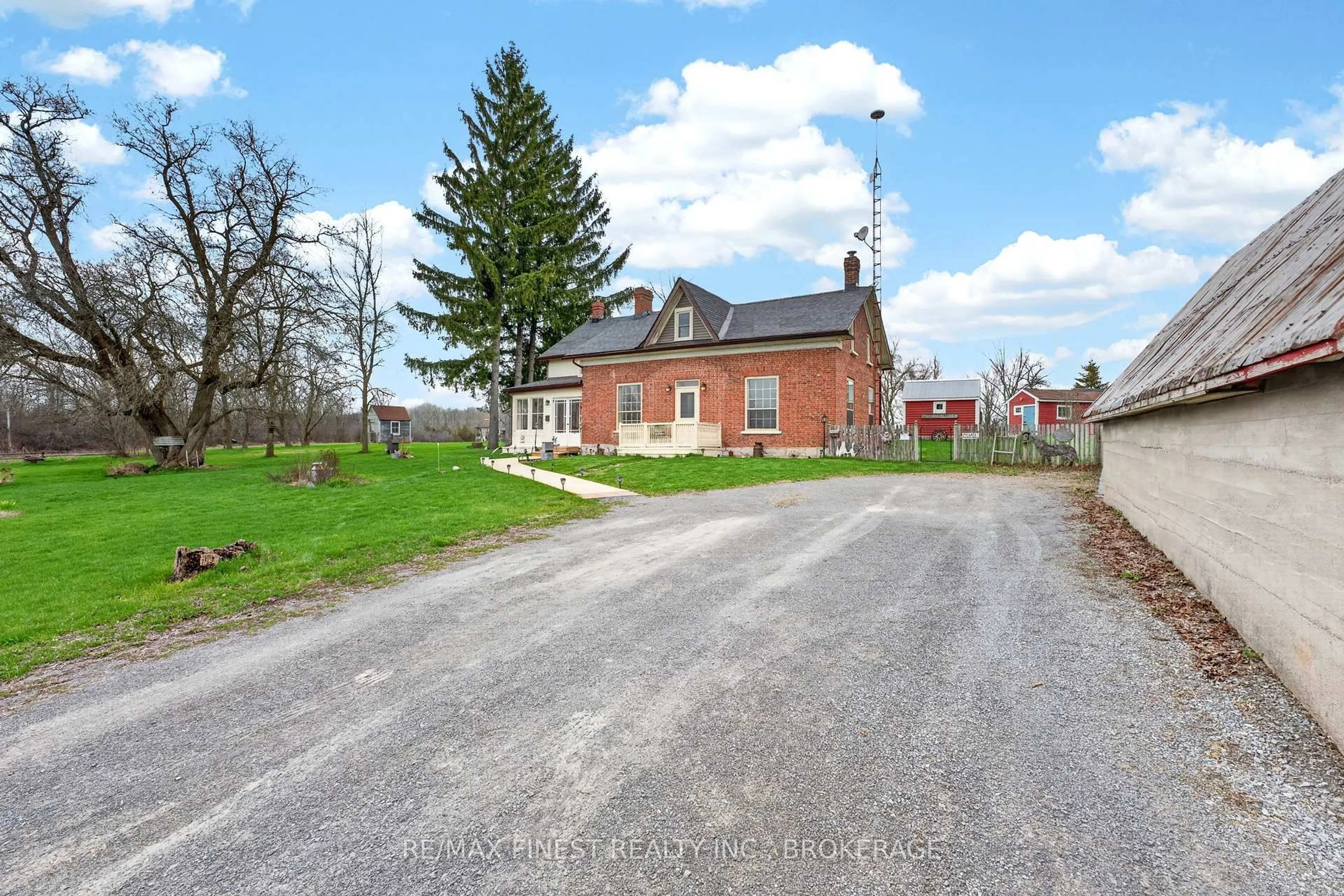A pic from outside/outdoor area/front of a property/back of a property/a pic from drone, street for 2173 Switzerville Rd, Loyalist Ontario K7R 3K9