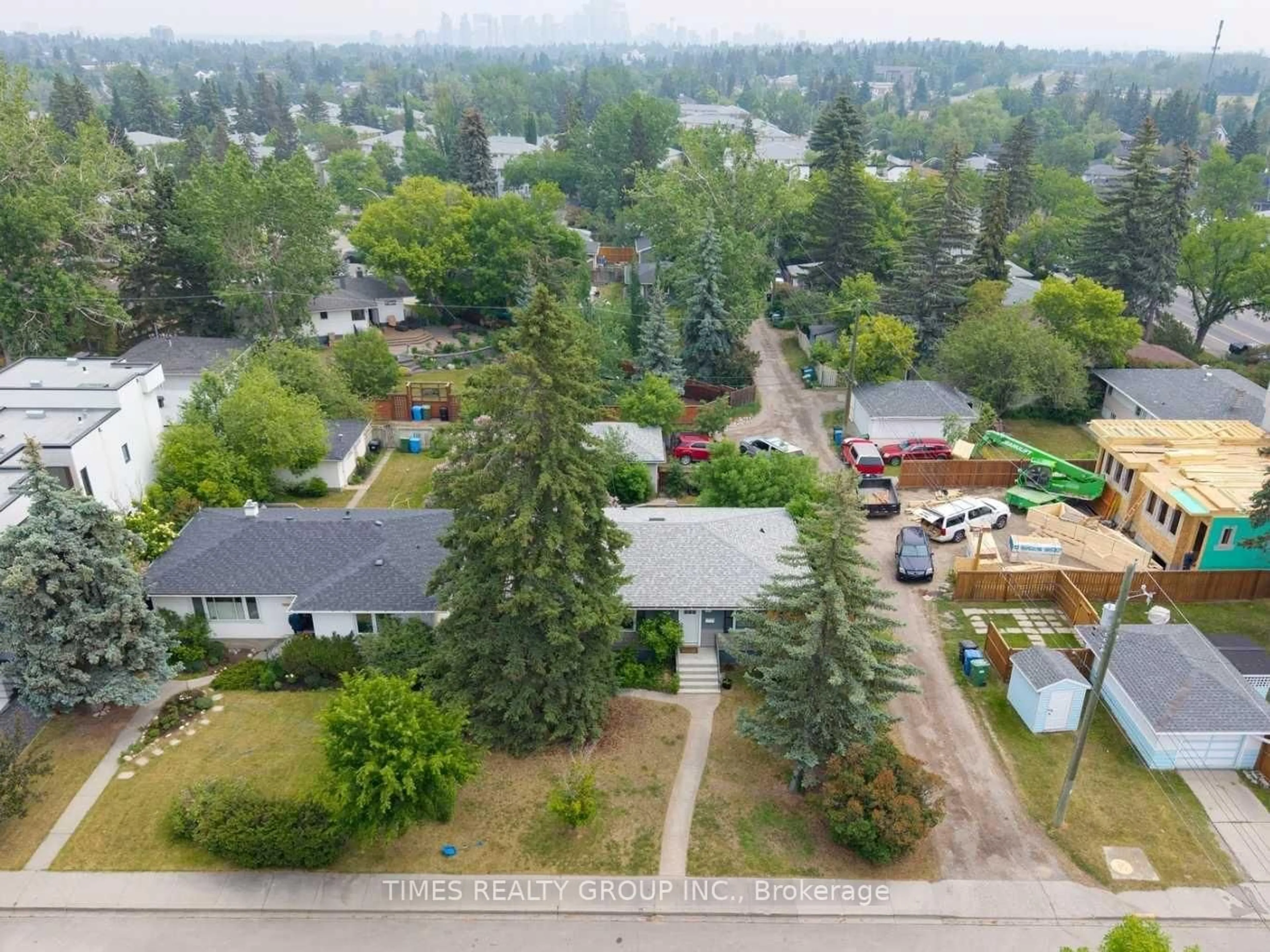 A pic from outside/outdoor area/front of a property/back of a property/a pic from drone, unknown for 3234 Kinsale Rd. SW, Out of Area Alberta T3E 4S2
