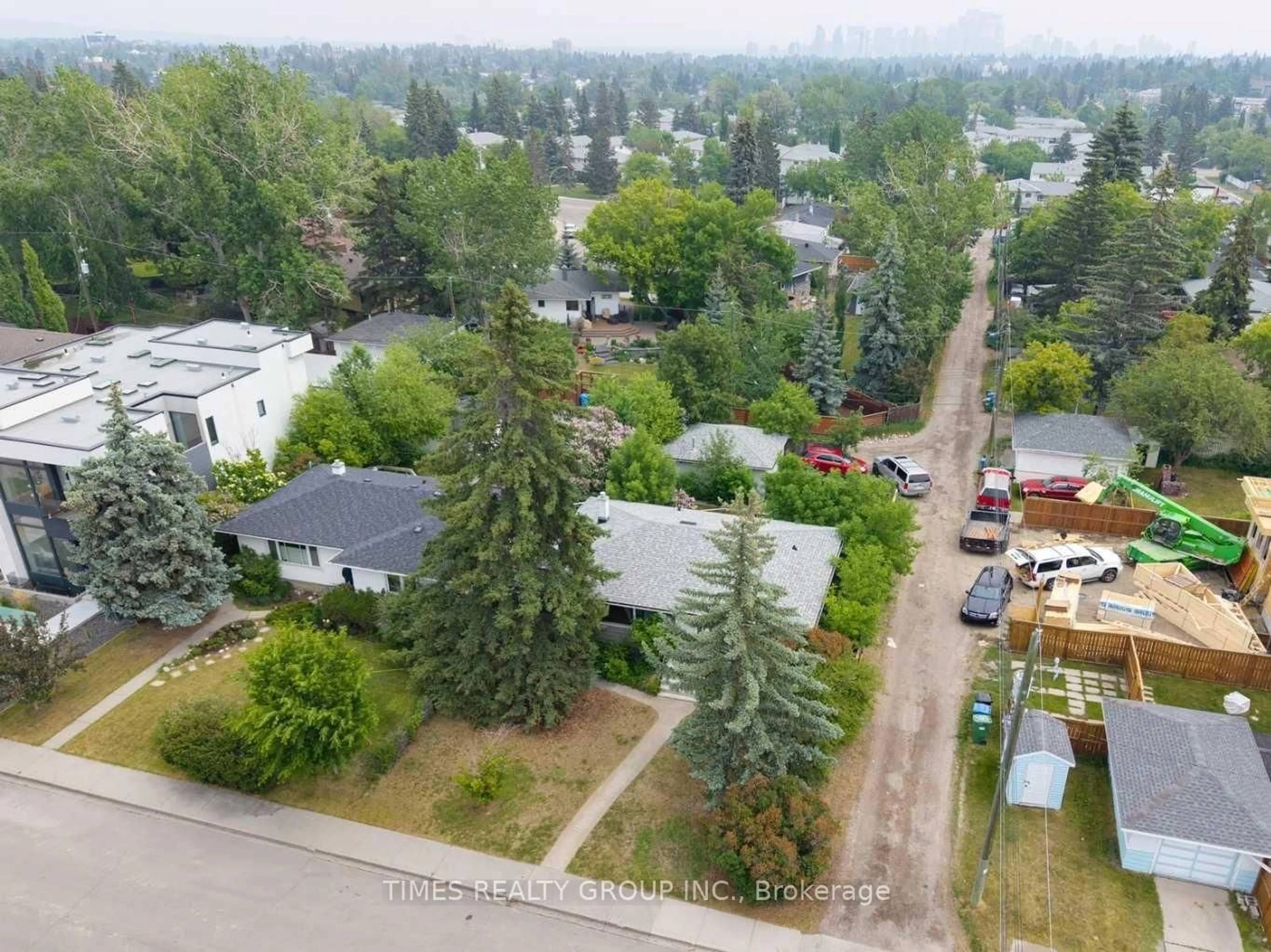 A pic from outside/outdoor area/front of a property/back of a property/a pic from drone, unknown for 3234 Kinsale Rd. SW, Out of Area Alberta T3E 4S2
