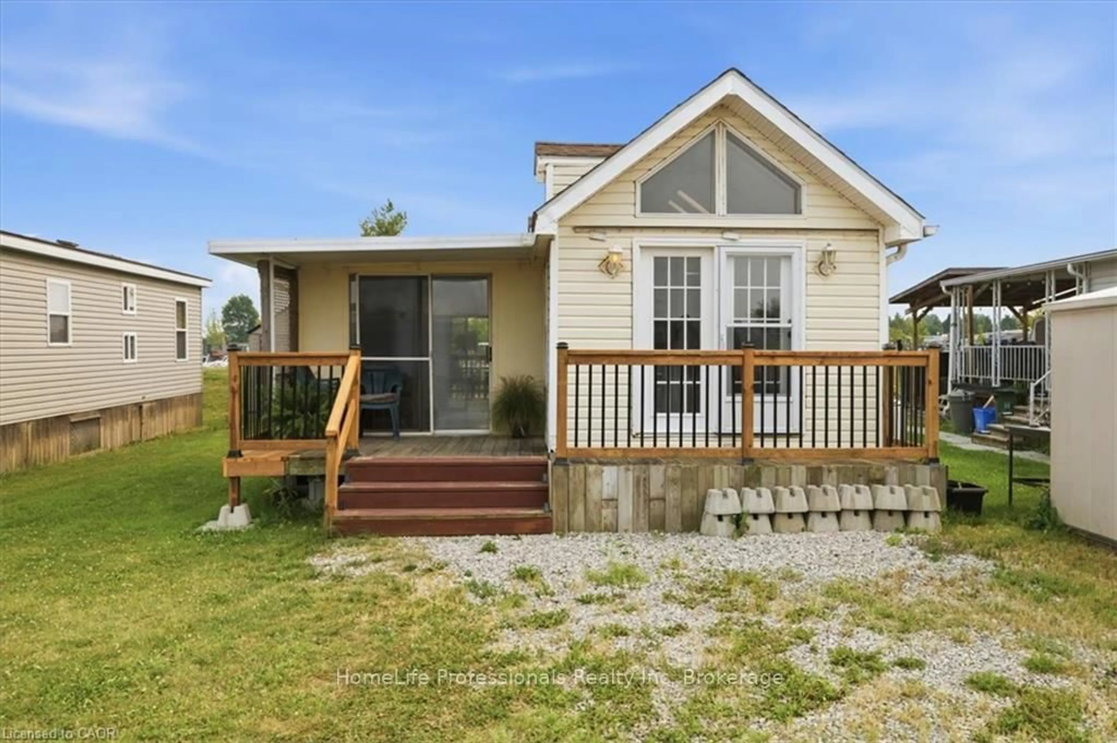 Home with vinyl exterior material, street for 659 PORT MAITLAND Rd #55L, Haldimand Ontario N1A 2W6