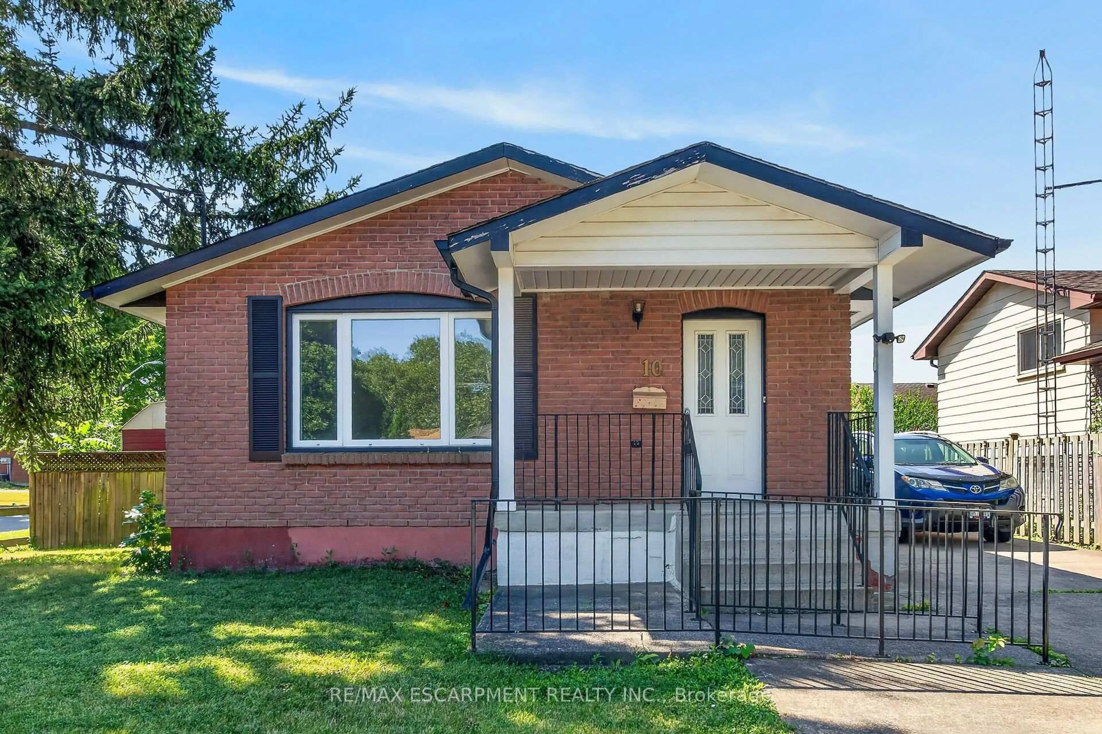Home with brick exterior material, street for 10 Tracey Rd, St. Catharines Ontario L2N 6P9