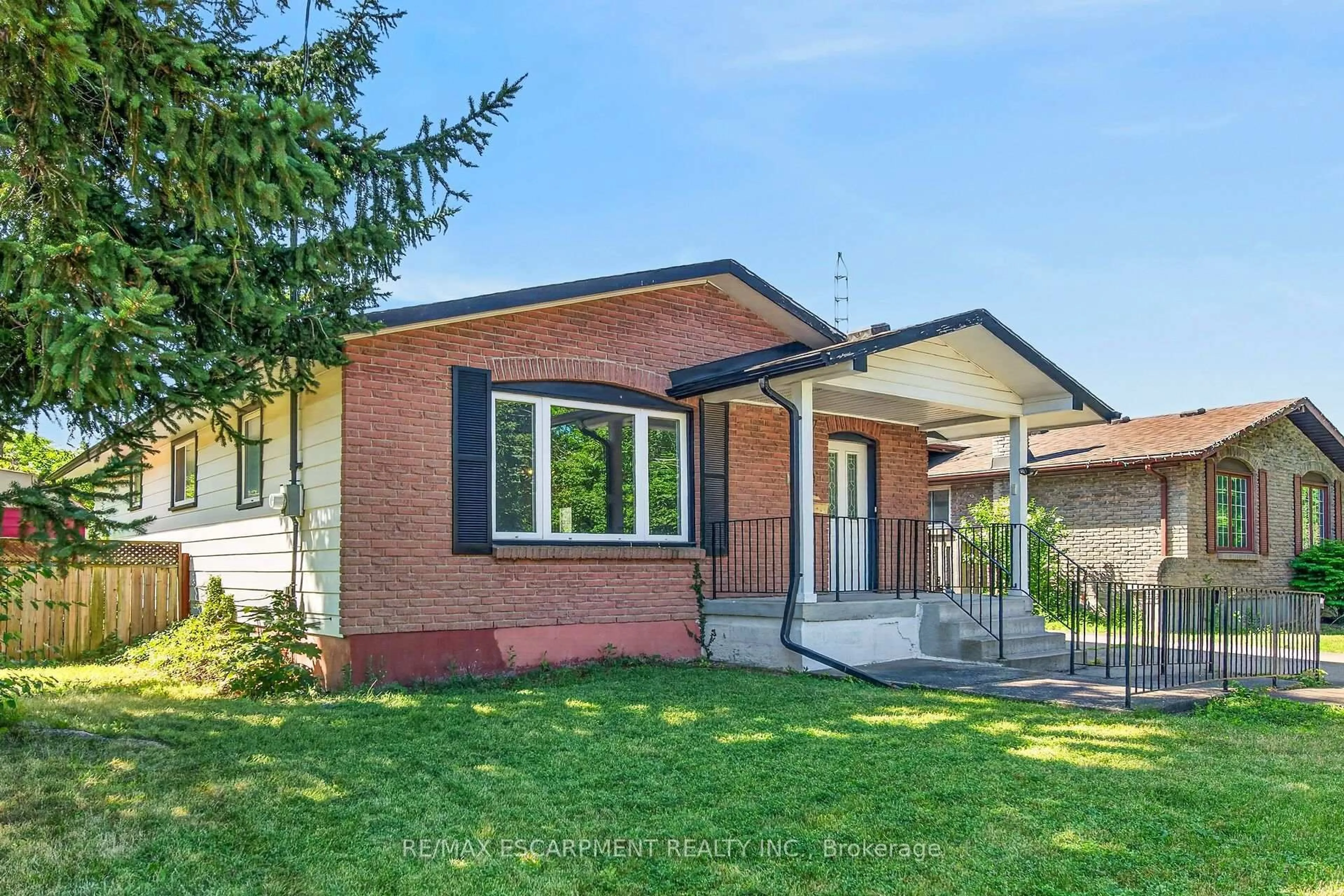 Home with brick exterior material, street for 10 Tracey Rd, St. Catharines Ontario L2N 6P9