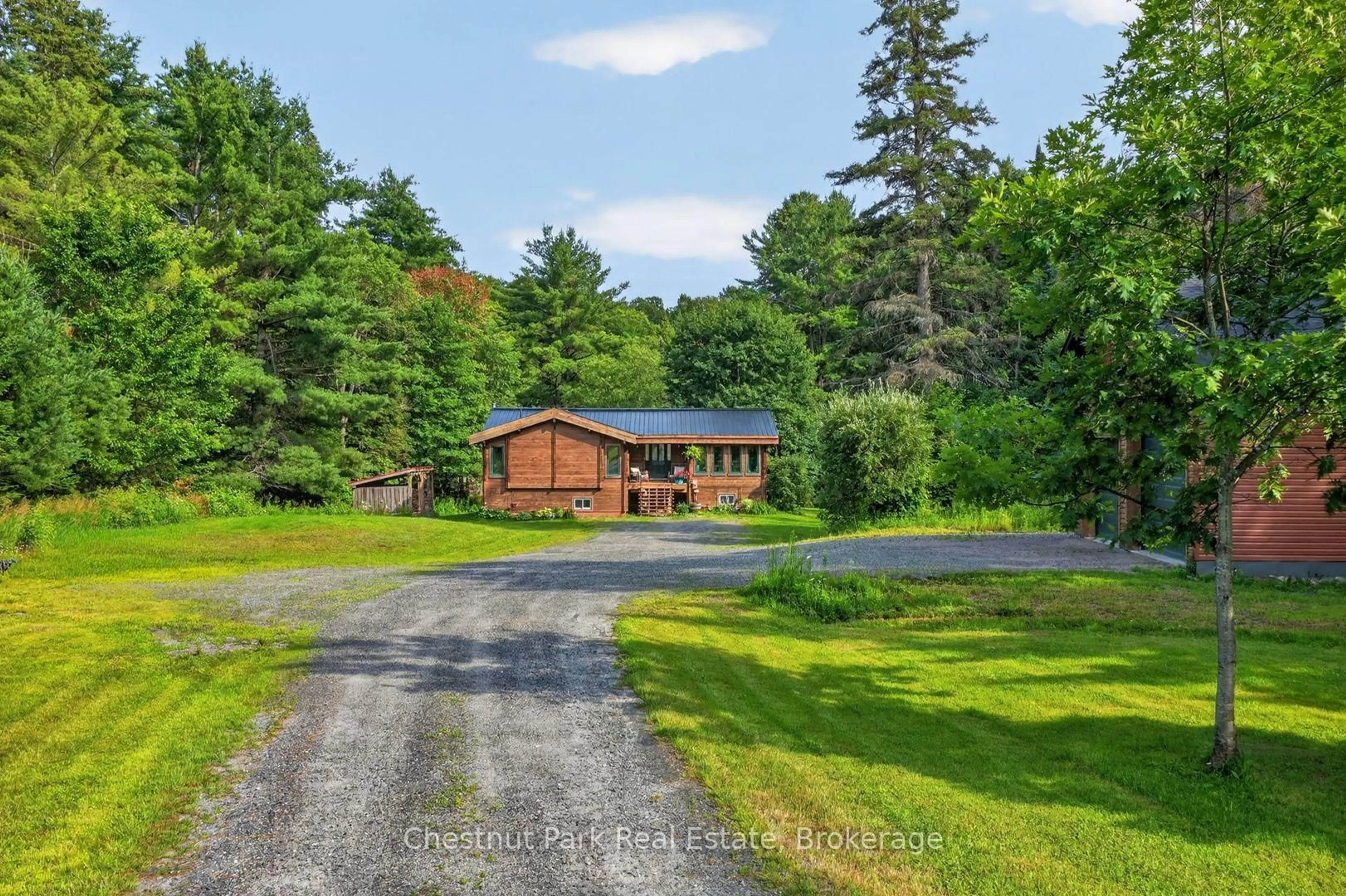 A pic from outside/outdoor area/front of a property/back of a property/a pic from drone, unknown for 1162 High Falls Rd, Bracebridge Ontario P1L 1W9