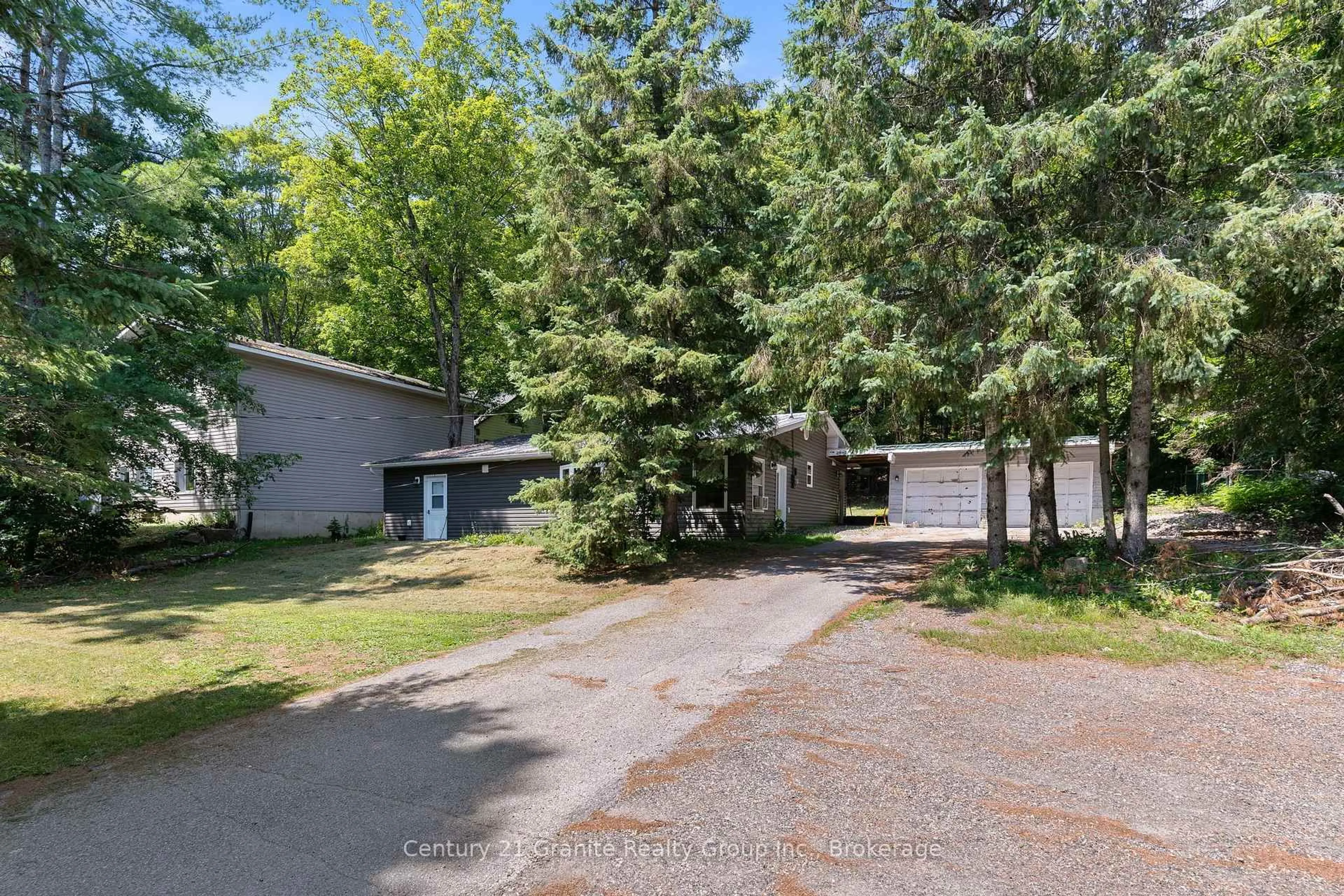 A pic from outside/outdoor area/front of a property/back of a property/a pic from drone, street for 4687 County Rd 21 Rd, Dysart et al Ontario K0M 1S0