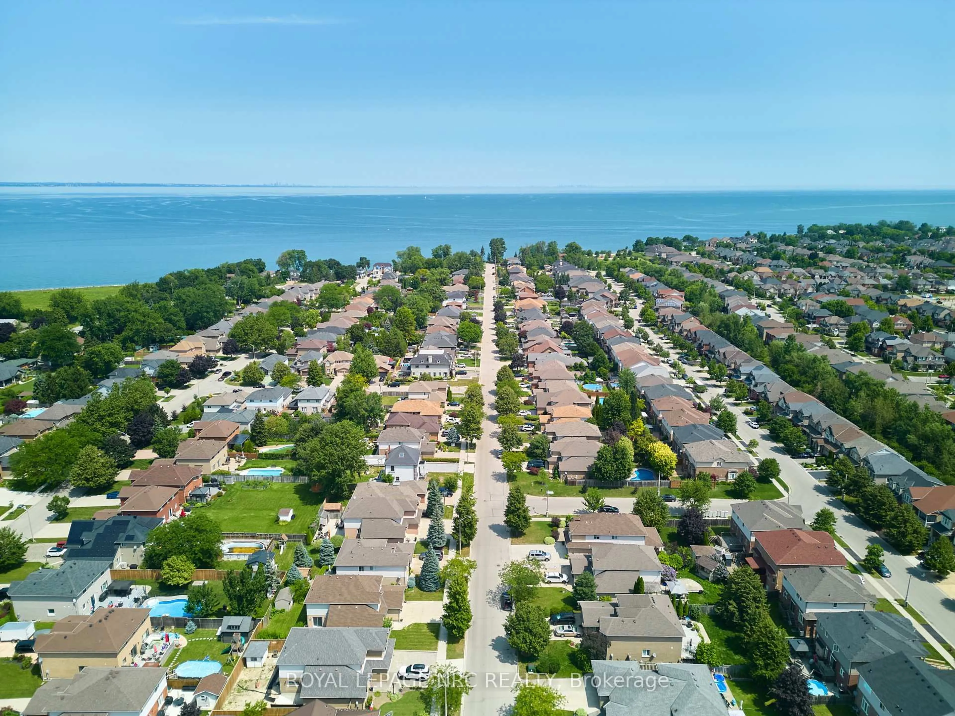 A pic from outside/outdoor area/front of a property/back of a property/a pic from drone, water/lake/river/ocean view for 15 Creanona Blvd, Hamilton Ontario L8E 5G2