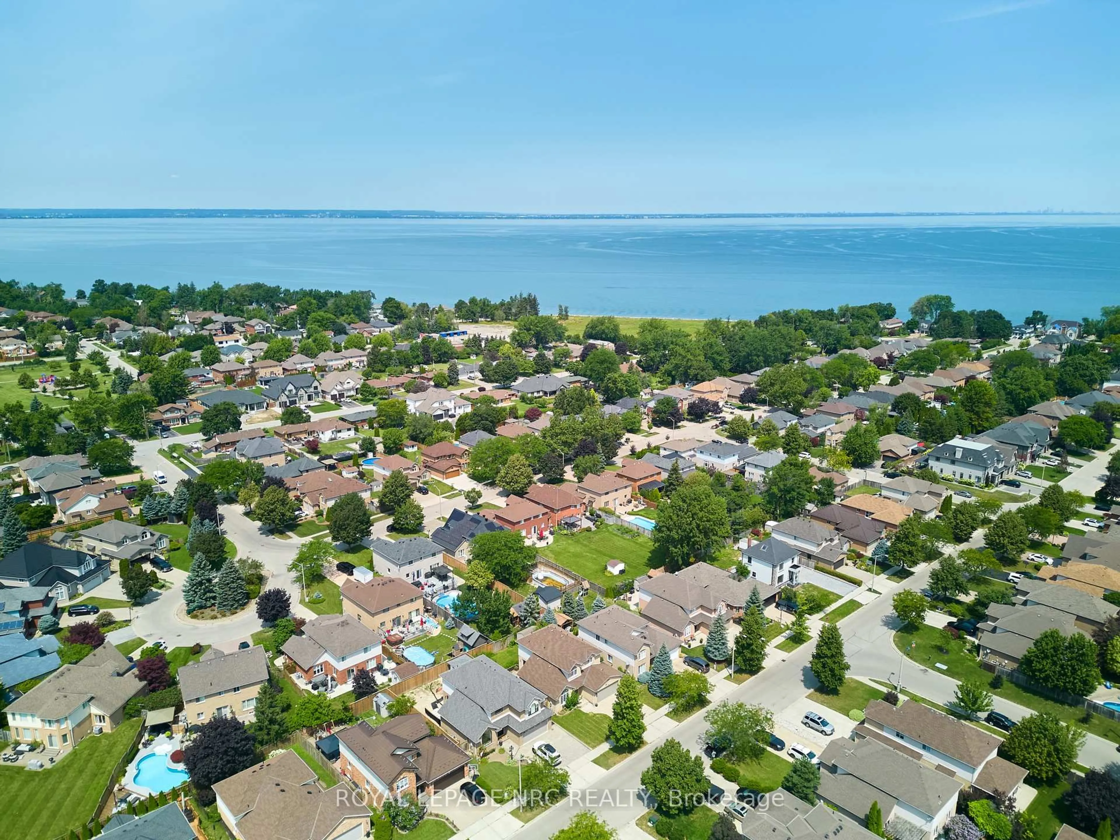 A pic from outside/outdoor area/front of a property/back of a property/a pic from drone, water/lake/river/ocean view for 15 Creanona Blvd, Hamilton Ontario L8E 5G2