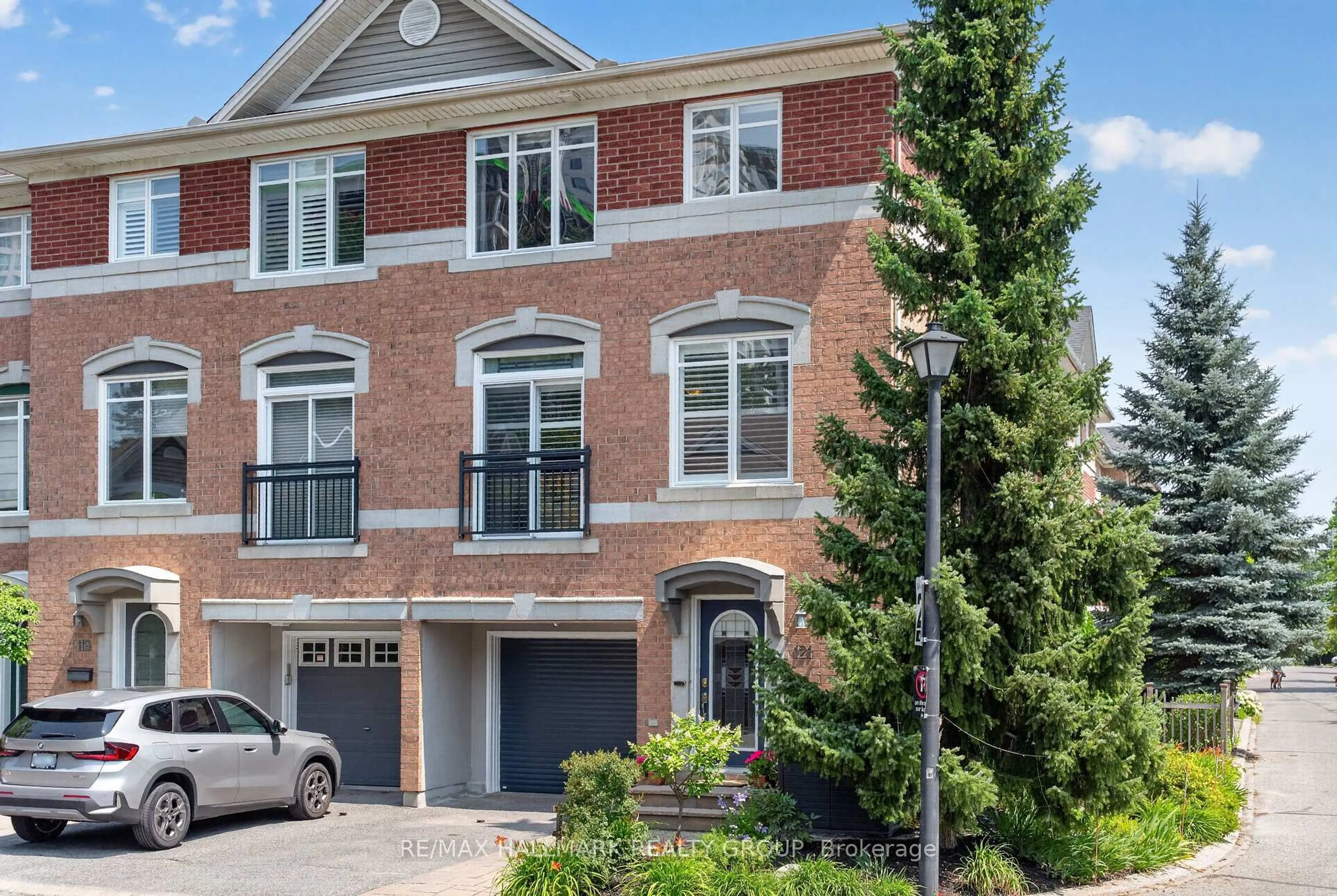 Home with brick exterior material, street for 121 West Village Private, Ottawa Ontario K1Z 1C9