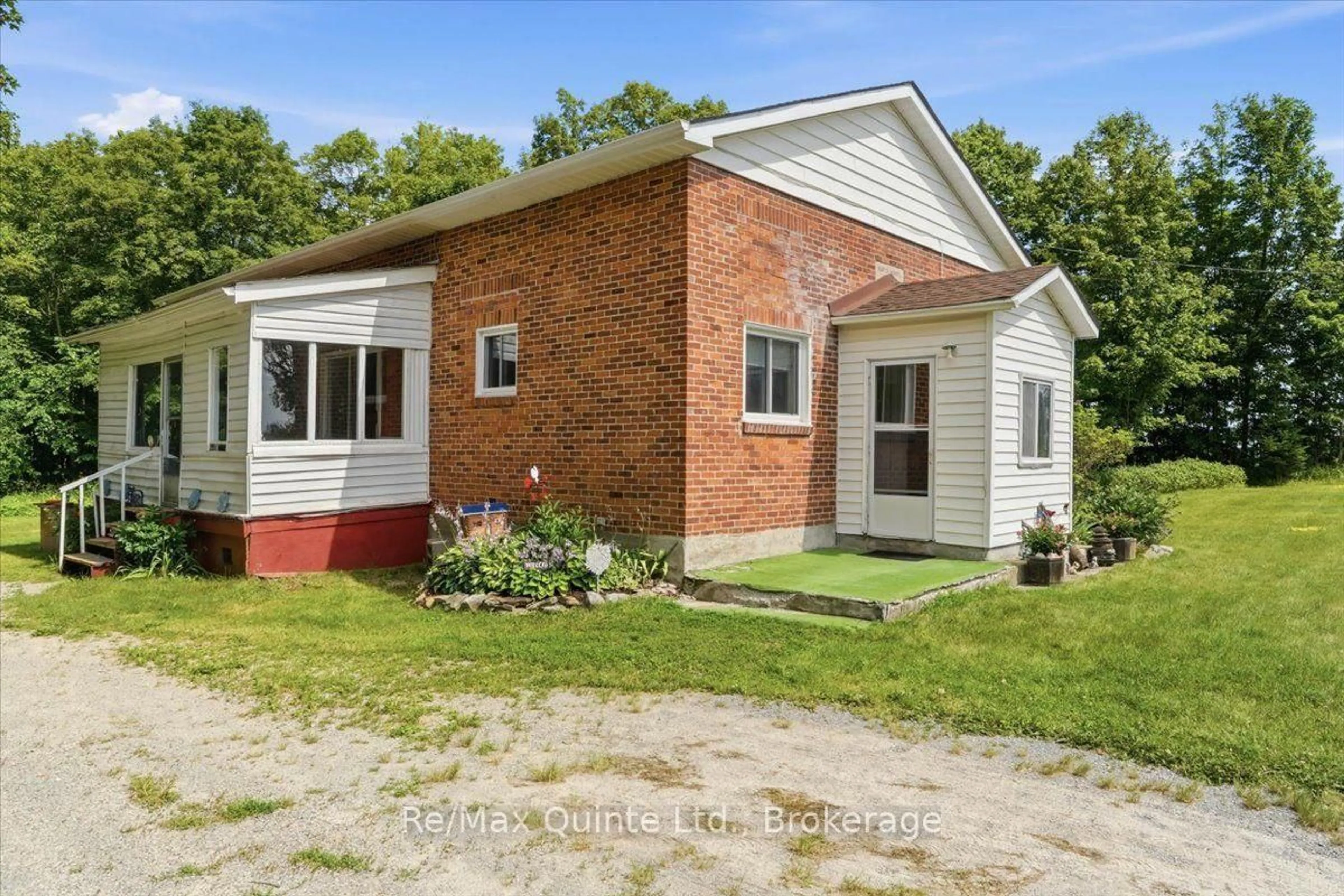 Home with brick exterior material, street for 16492 Highway 62, Madoc Ontario K0K 1Y0