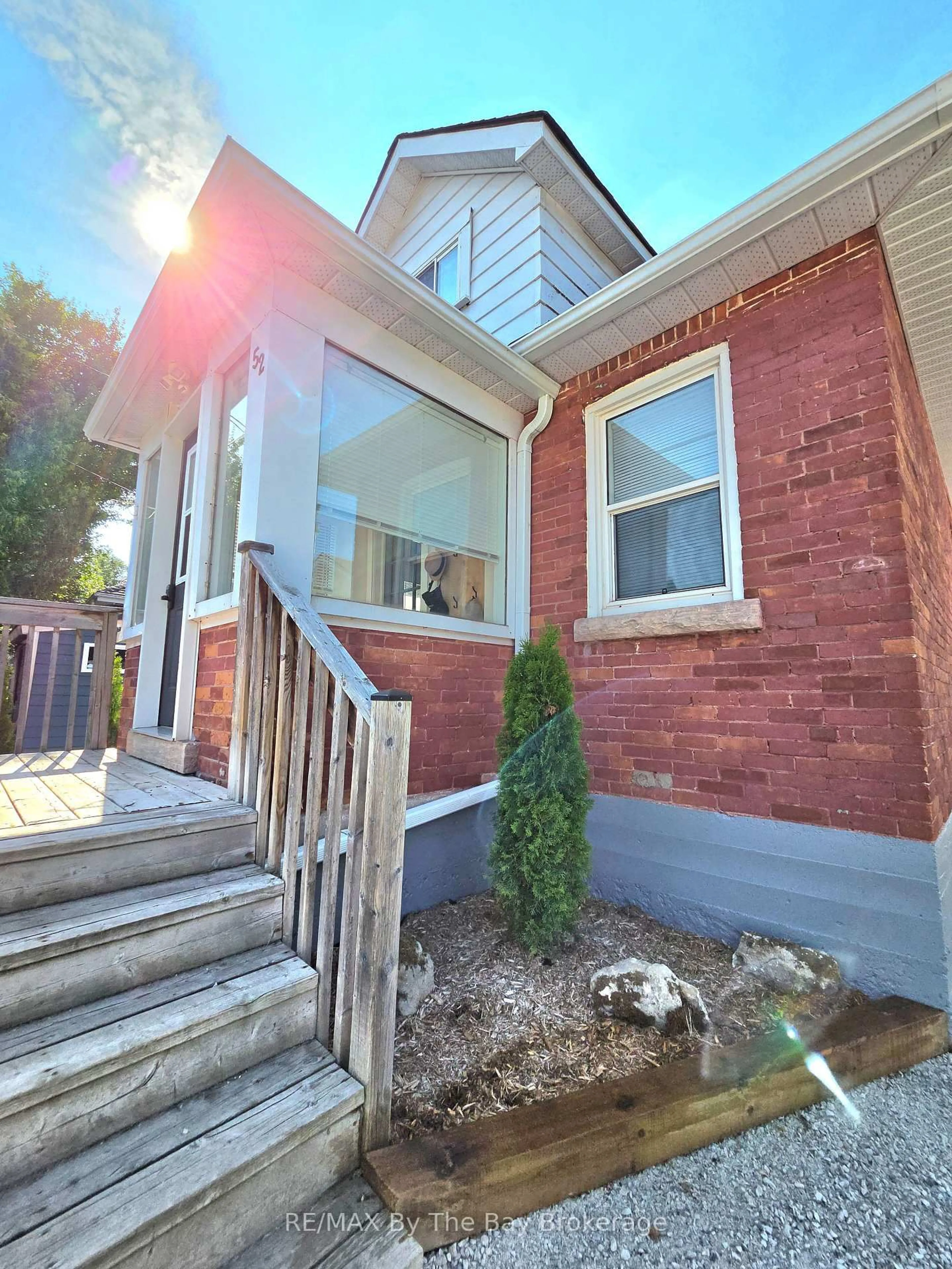 Home with brick exterior material, street for 52 Berry St, Meaford Ontario N4L 1V3