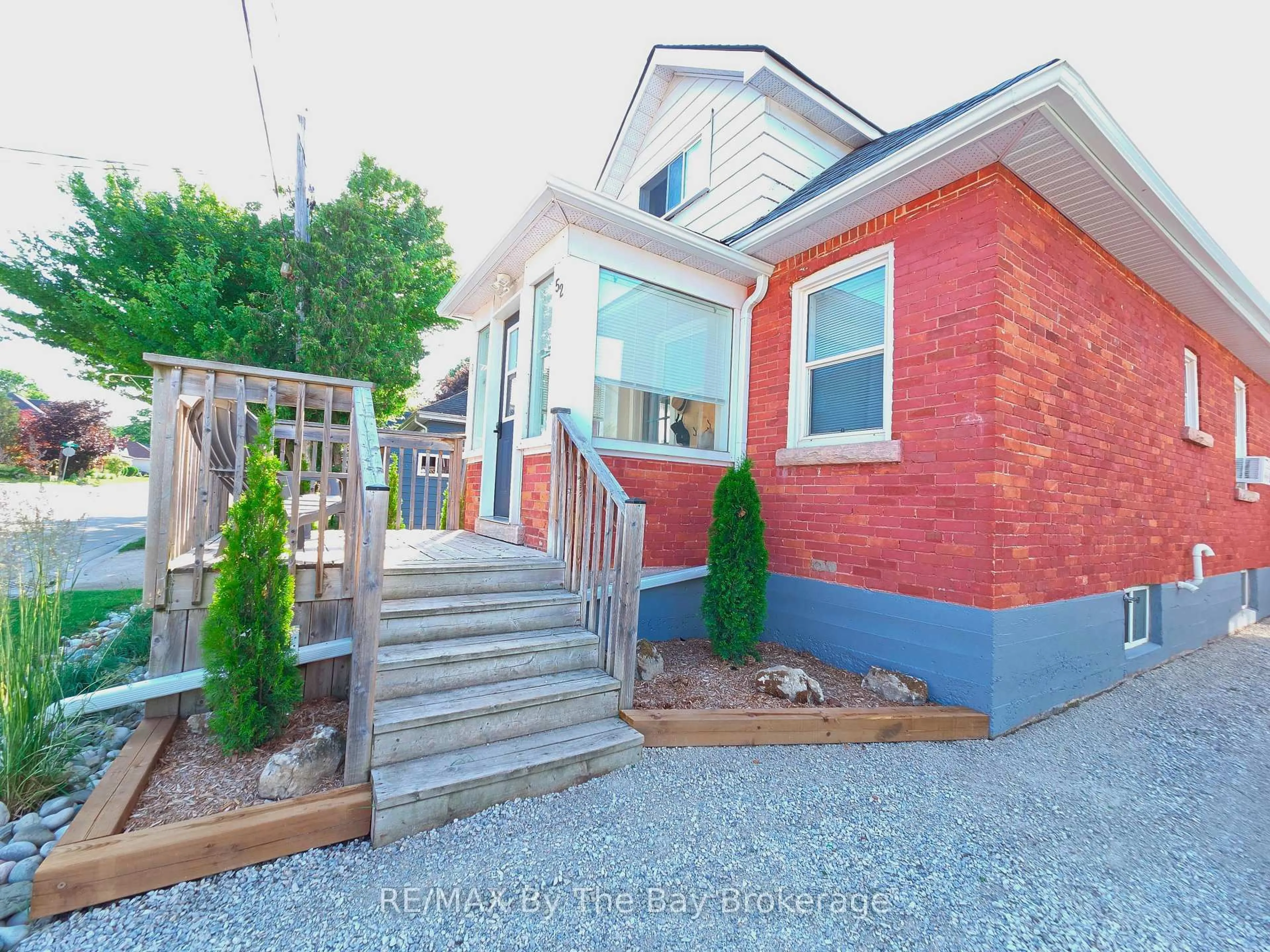 Home with brick exterior material, street for 52 Berry St, Meaford Ontario N4L 1V3