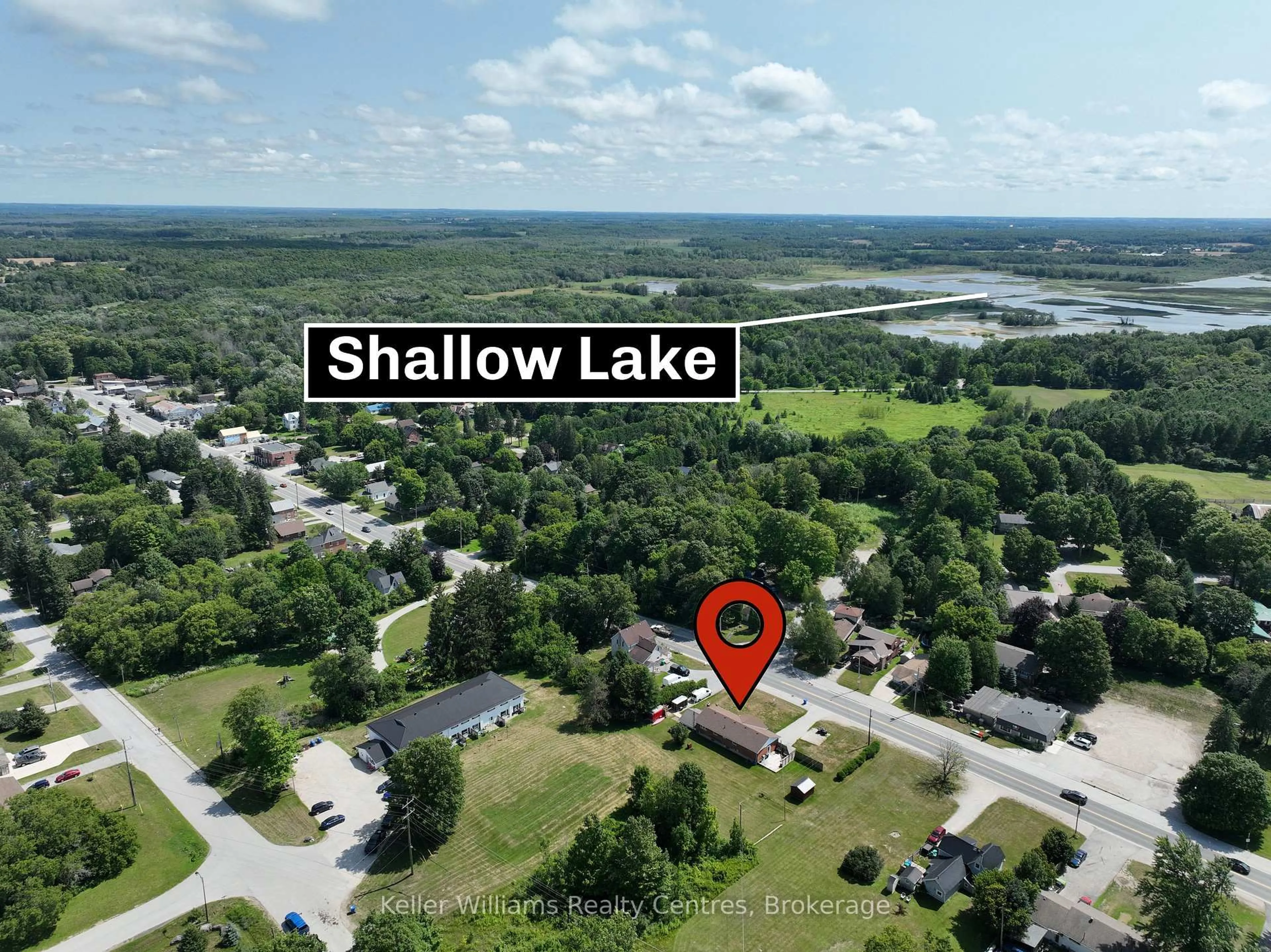 A pic from outside/outdoor area/front of a property/back of a property/a pic from drone, water/lake/river/ocean view for 458 Princess St, Georgian Bluffs Ontario N0H 2K0