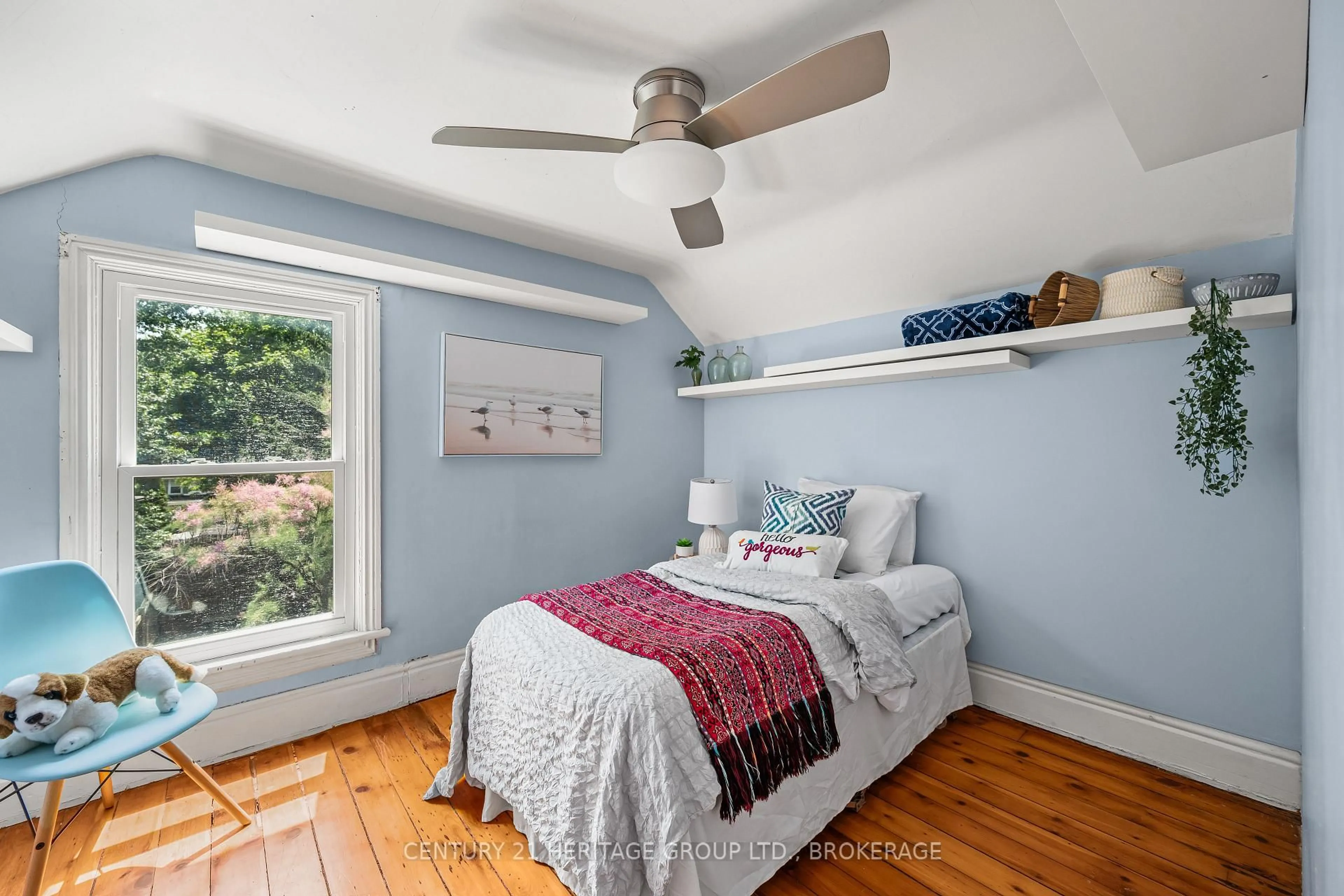Bedroom with bed, wood/laminate floor for 18 Pine St, Kingston Ontario K7K 1W1
