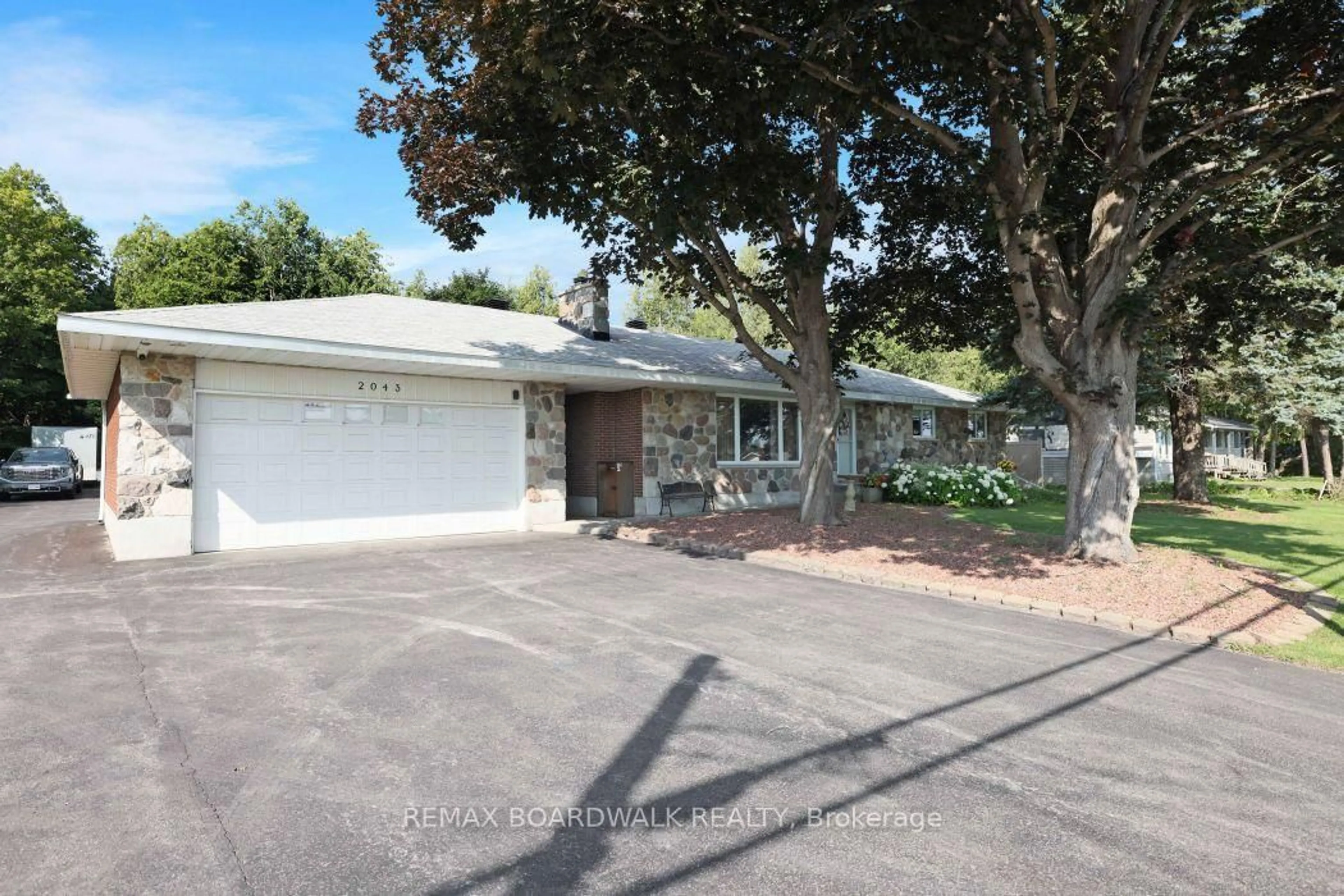 A pic from outside/outdoor area/front of a property/back of a property/a pic from drone, street for 2043 Carp Rd, Carp Ontario K0A 1L0