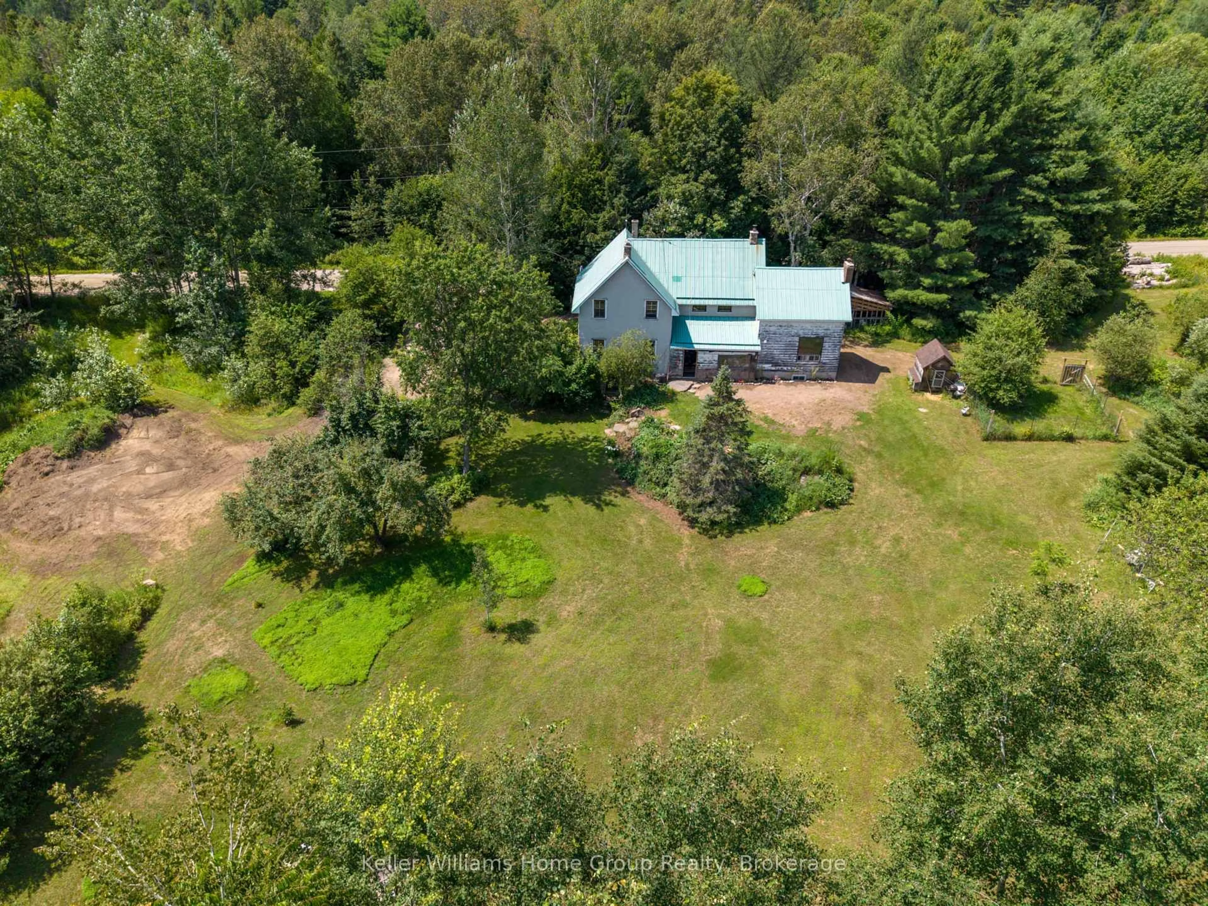 A pic from outside/outdoor area/front of a property/back of a property/a pic from drone, forest/trees view for 1794 East Road Loop, Maynooth Ontario K0L 2S0