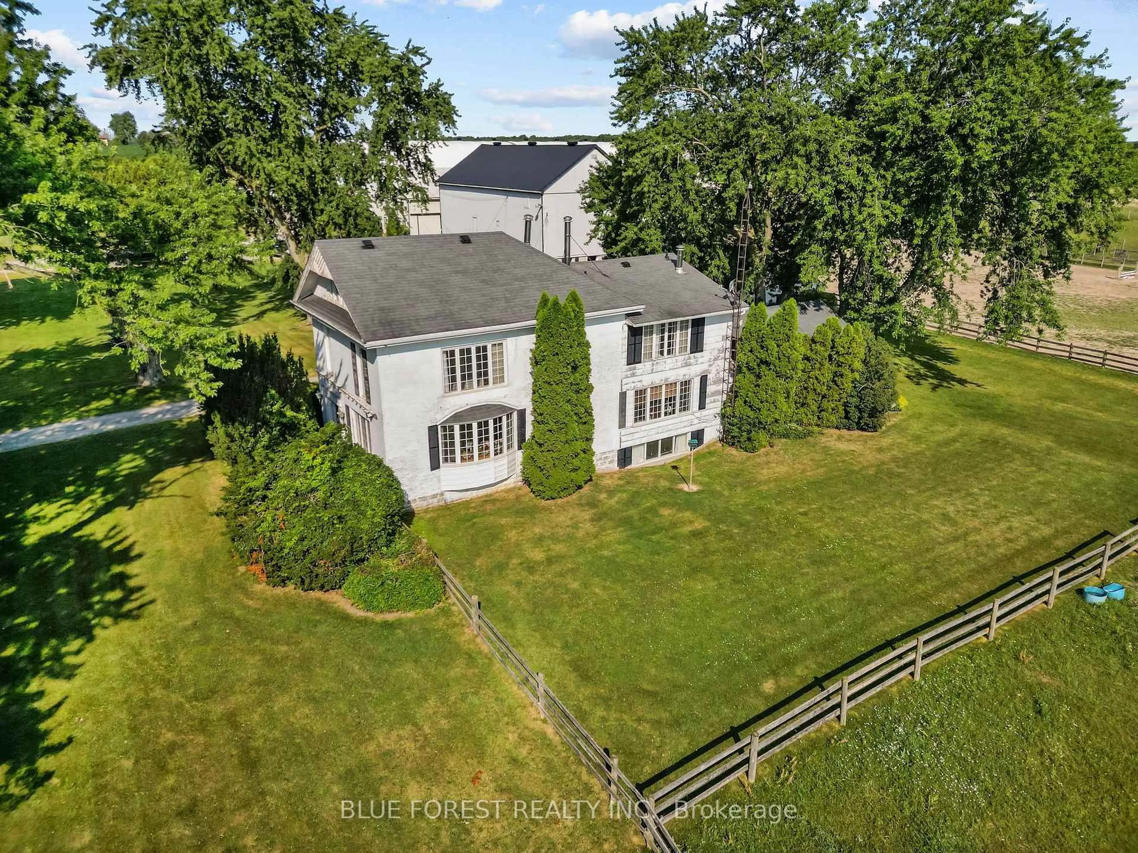 A pic from outside/outdoor area/front of a property/back of a property/a pic from drone, unknown for 12798 EIGHT MILE Rd, Middlesex Centre Ontario N0M 1C0