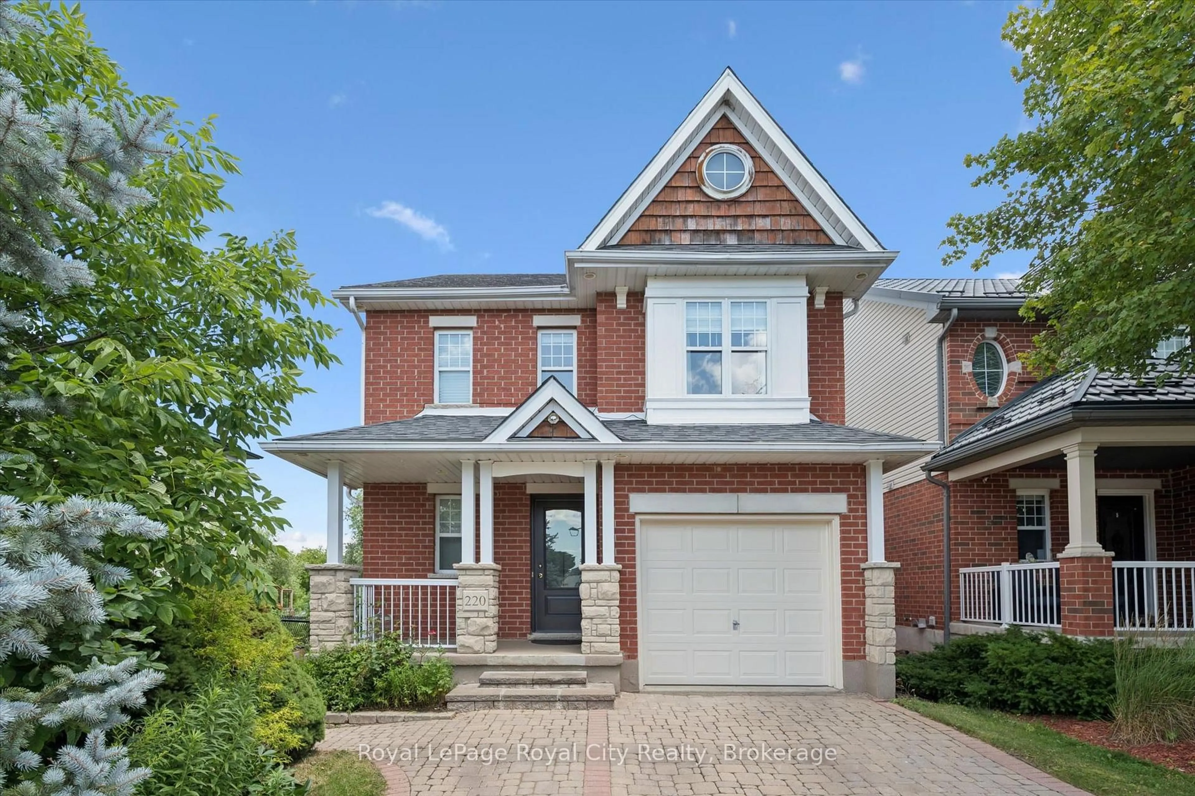 Home with brick exterior material, street for 220 Carrington Dr, Guelph Ontario N1G 5K3