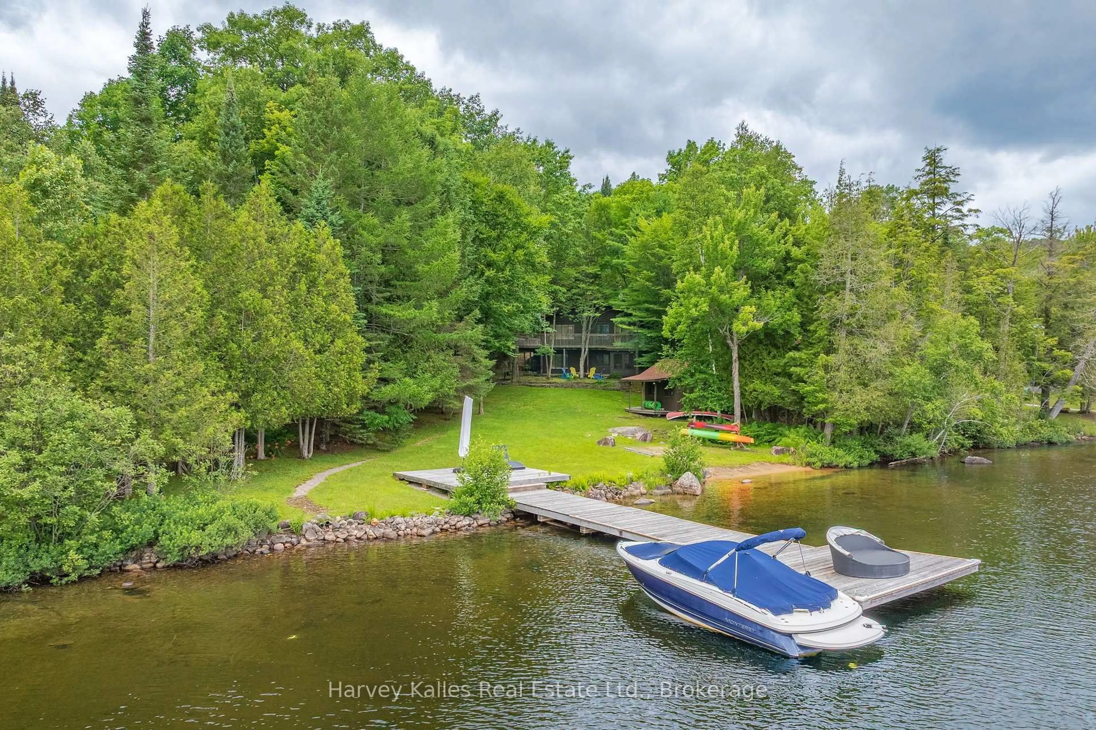 A pic from outside/outdoor area/front of a property/back of a property/a pic from drone, water/lake/river/ocean view for 4169 South Portage Rd, Huntsville Ontario P1H 2J3