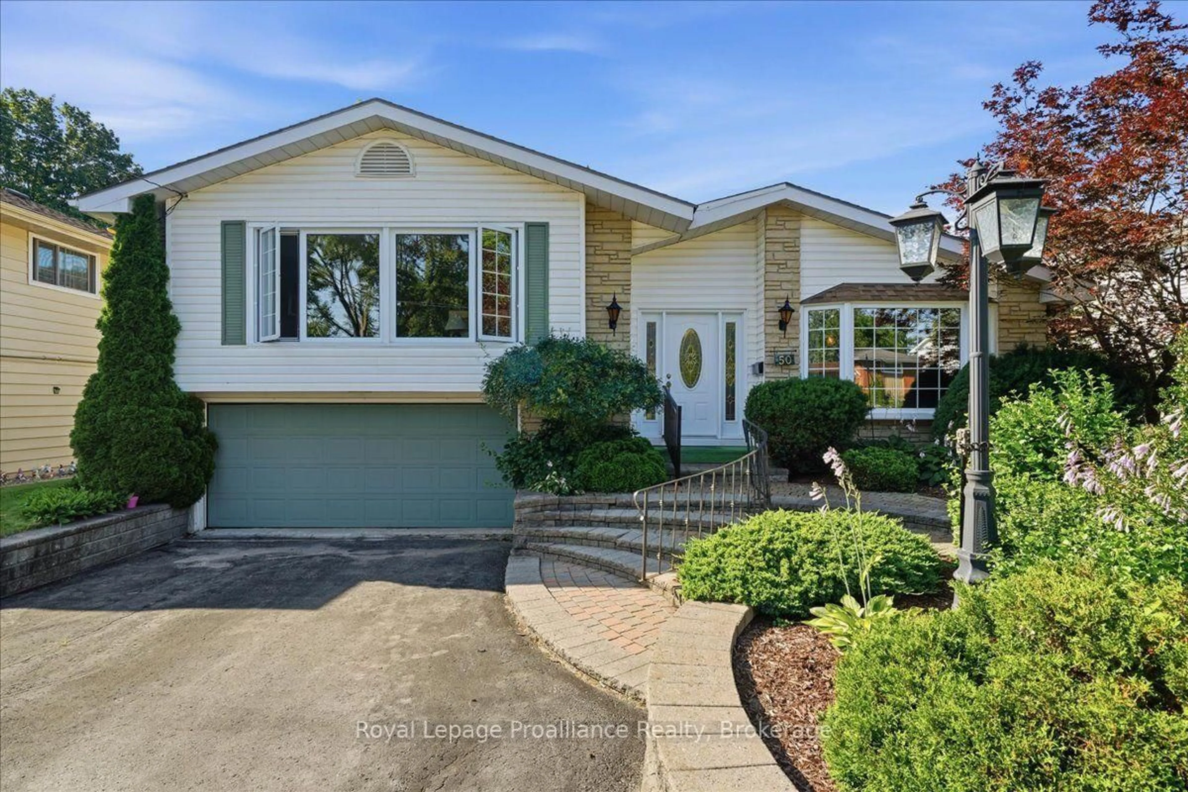 Home with vinyl exterior material, street for 50 Melrose Cres, Belleville Ontario K8N 1X9
