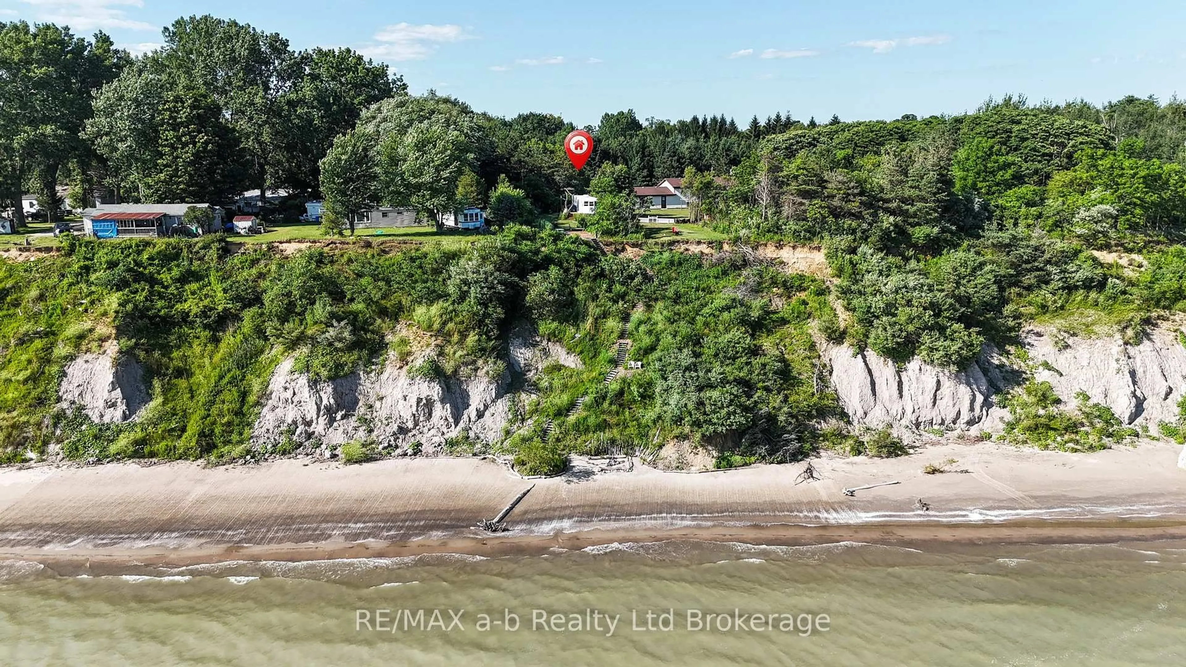 A pic from outside/outdoor area/front of a property/back of a property/a pic from drone, water/lake/river/ocean view for 55424 Lakeshore Rd, Bayham Ontario N0J 1T0