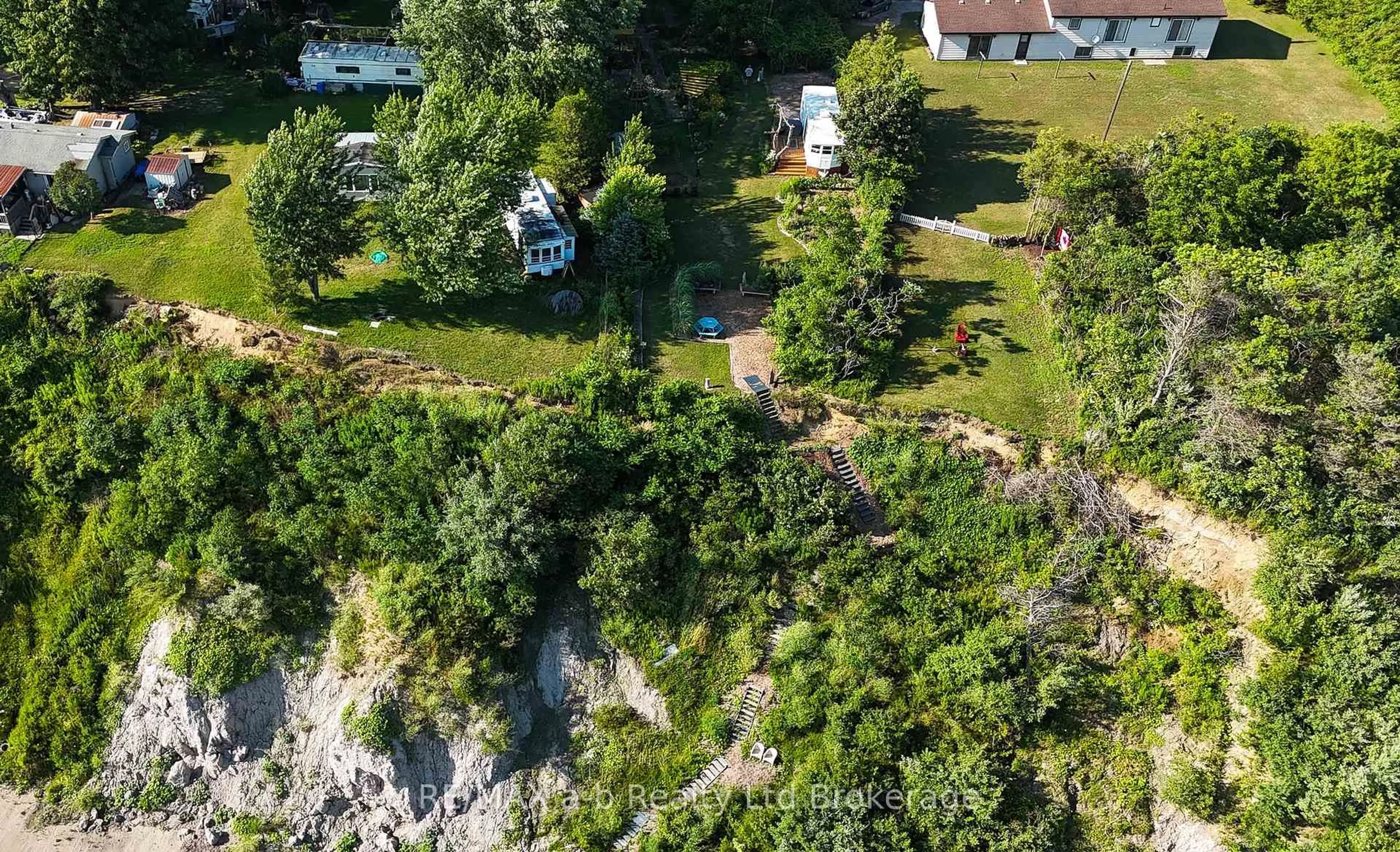 A pic from outside/outdoor area/front of a property/back of a property/a pic from drone, unknown for 55424 Lakeshore Rd, Bayham Ontario N0J 1T0