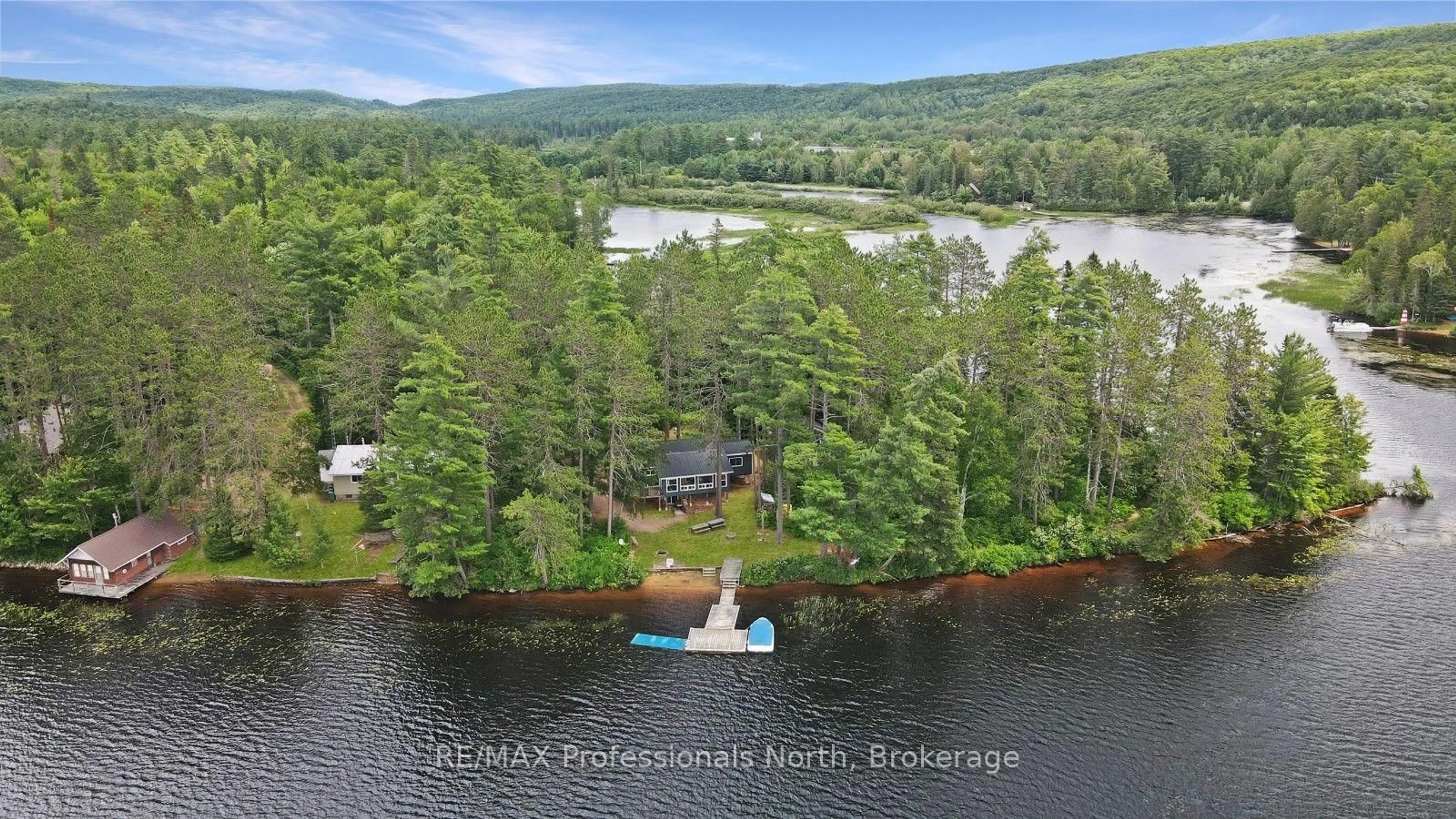 A pic from outside/outdoor area/front of a property/back of a property/a pic from drone, water/lake/river/ocean view for 1053 Cheerful Lane, Dysart et al Ontario K0L 1M1