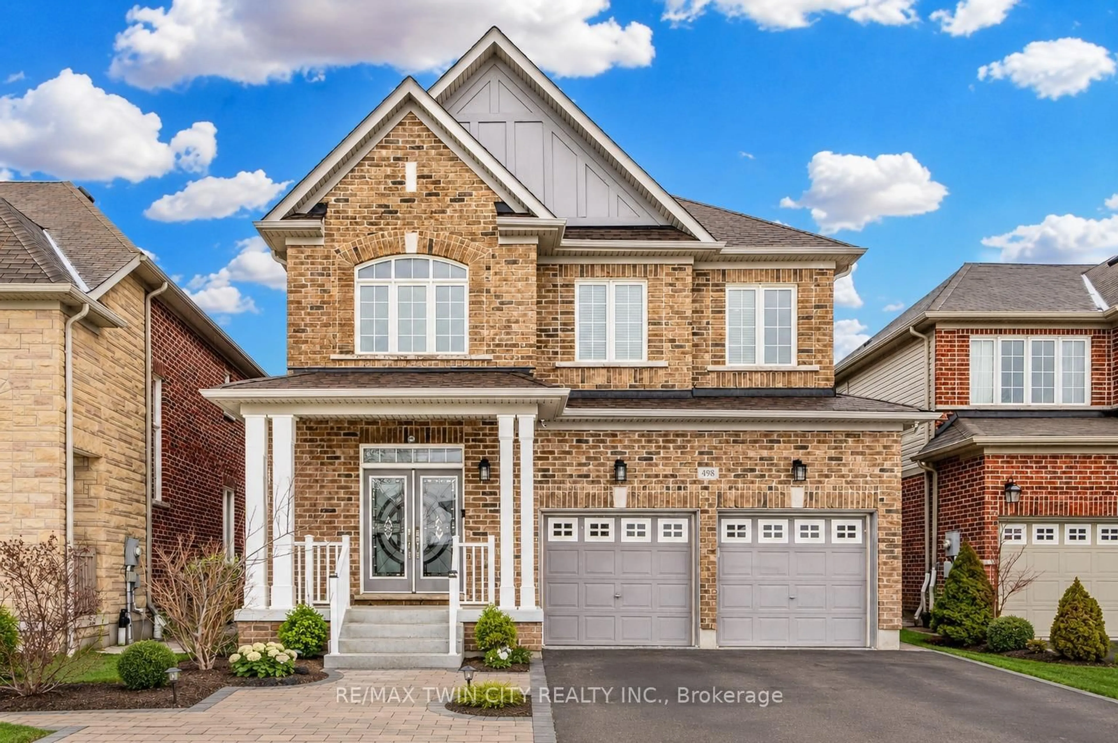 Home with brick exterior material, street for 498 Thomas Slee Dr, Kitchener Ontario N2P 2Y1