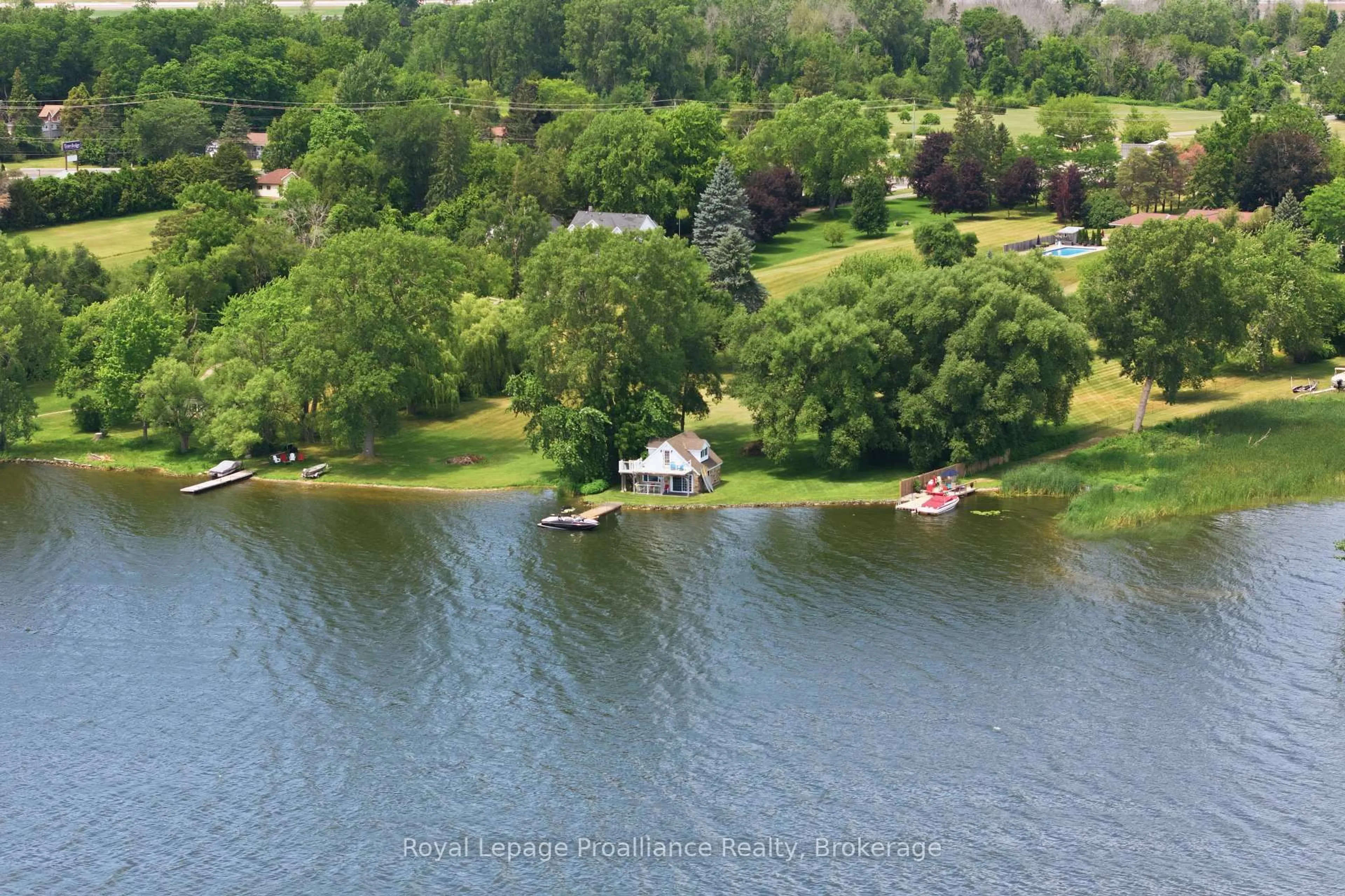 A pic from outside/outdoor area/front of a property/back of a property/a pic from drone, water/lake/river/ocean view for 658 Old Highway 2, Quinte West Ontario K8V 5P5