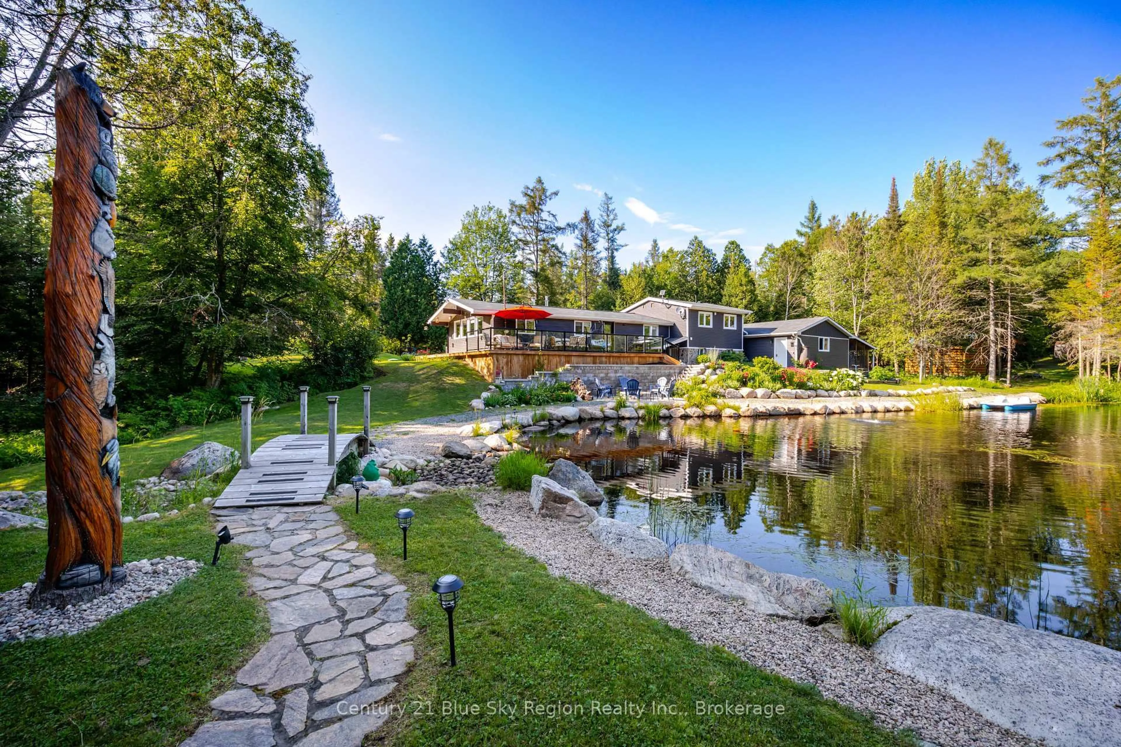 A pic from outside/outdoor area/front of a property/back of a property/a pic from drone, water/lake/river/ocean view for 695 Weiler Line, Powassan Ontario P0H 2L0