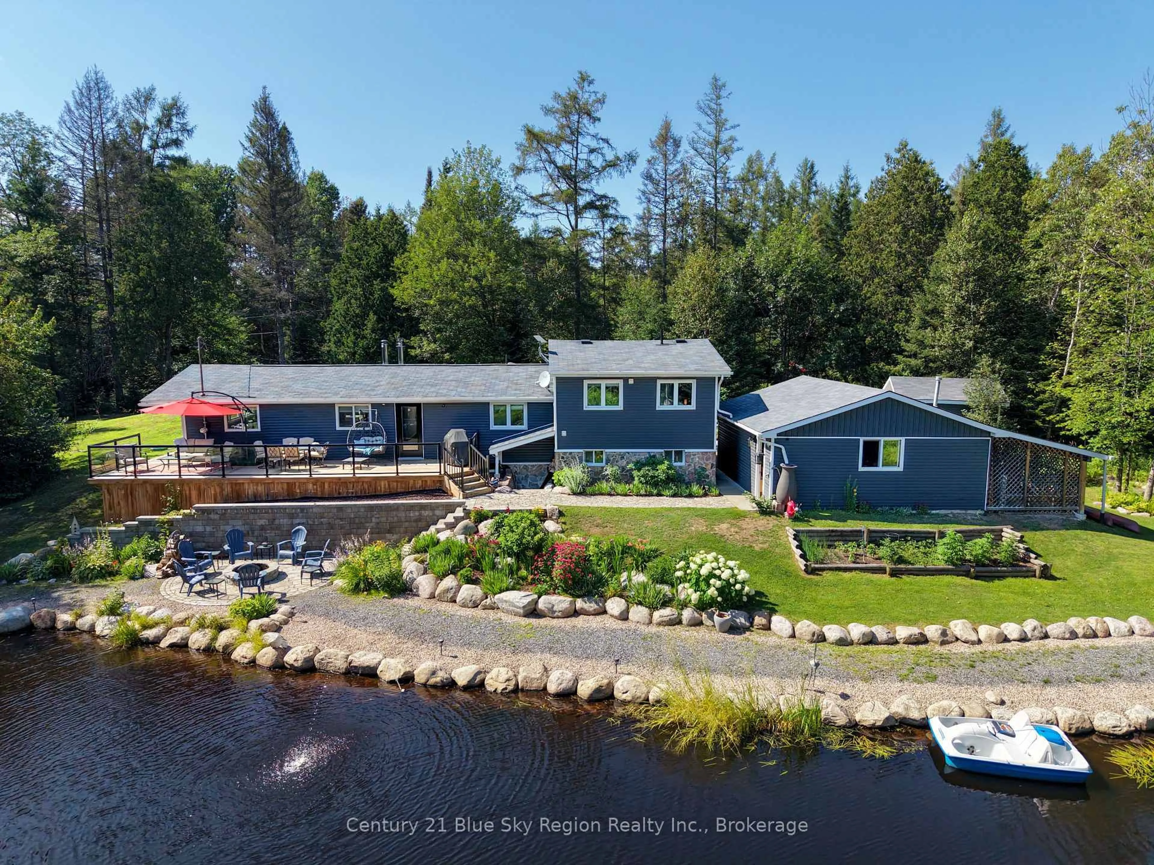 A pic from outside/outdoor area/front of a property/back of a property/a pic from drone, water/lake/river/ocean view for 695 Weiler Line, Powassan Ontario P0H 2L0