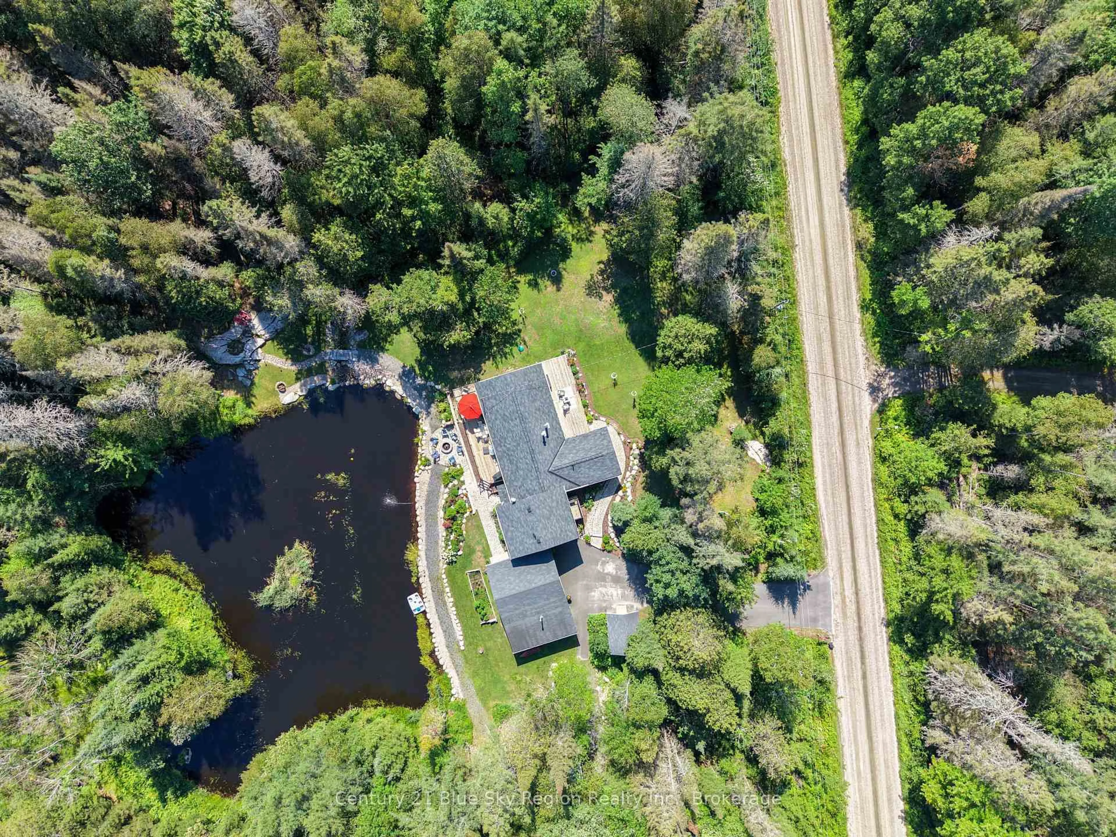 A pic from outside/outdoor area/front of a property/back of a property/a pic from drone, water/lake/river/ocean view for 695 Weiler Line, Powassan Ontario P0H 2L0