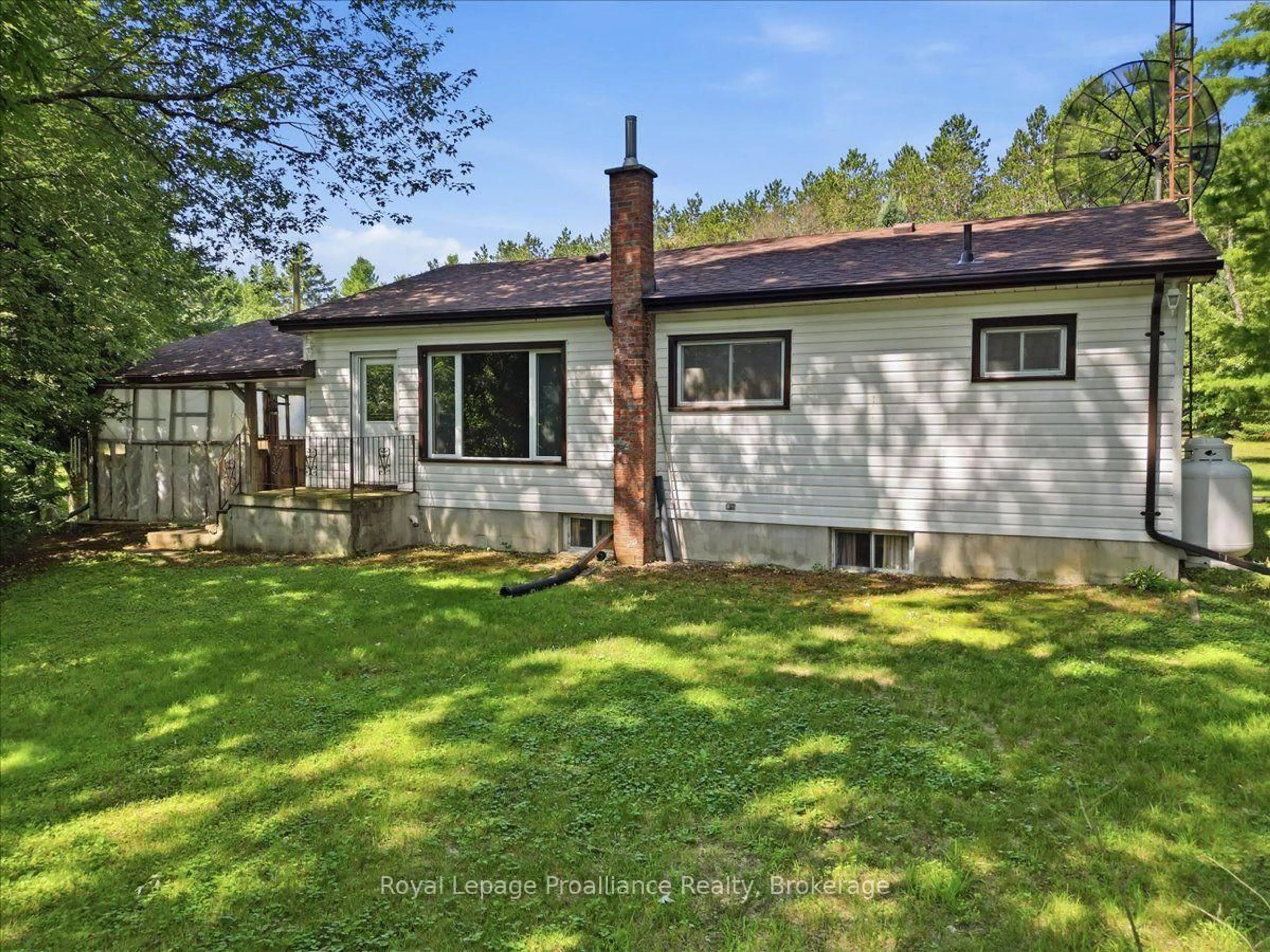 A pic from outside/outdoor area/front of a property/back of a property/a pic from drone, unknown for 42-B Hawkins Bay Rd, Tweed Ontario K0K 3J0