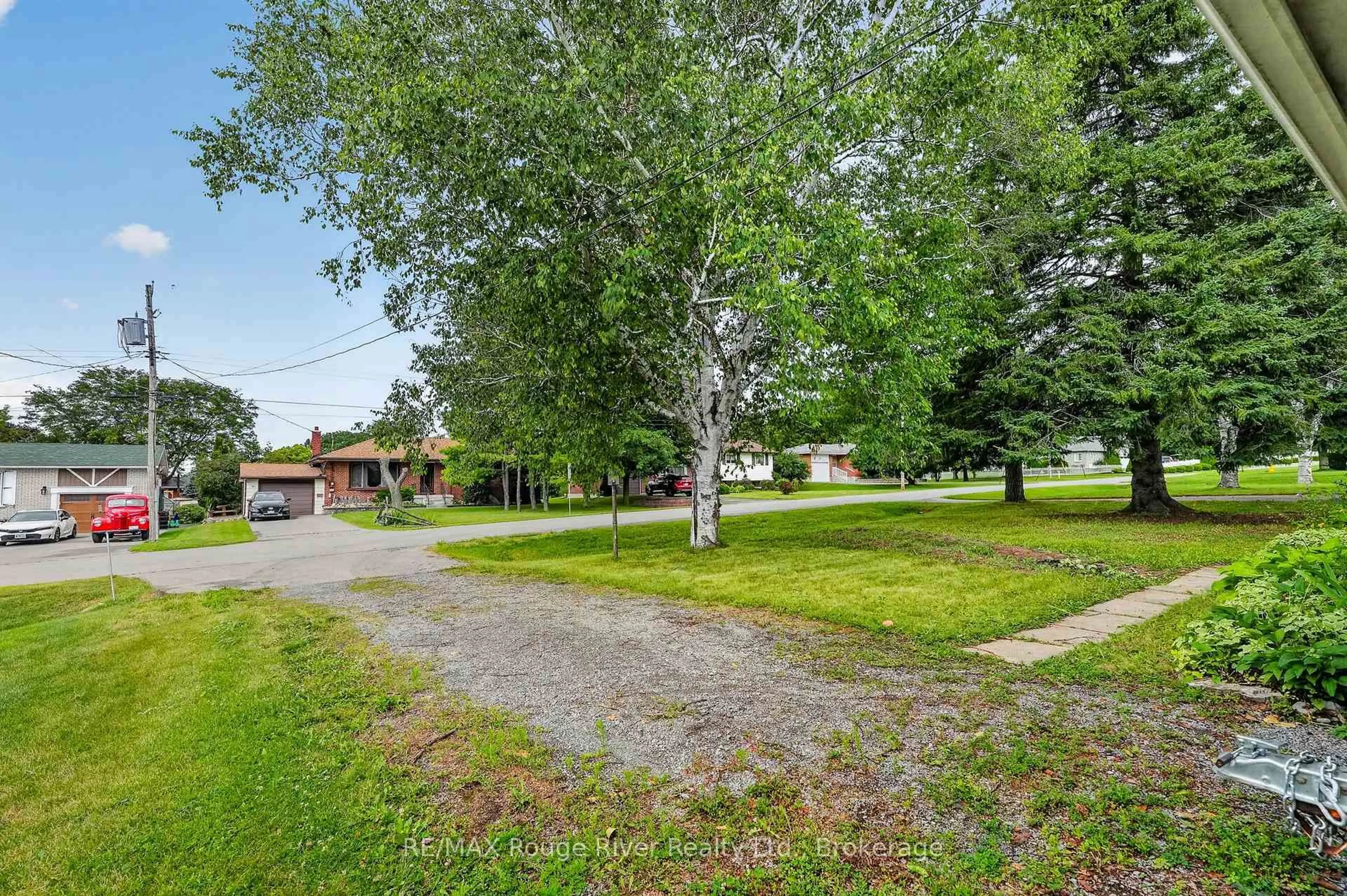 A pic from outside/outdoor area/front of a property/back of a property/a pic from drone, street for 20 Catherine St, Hamilton Township Ontario K9A 4V1