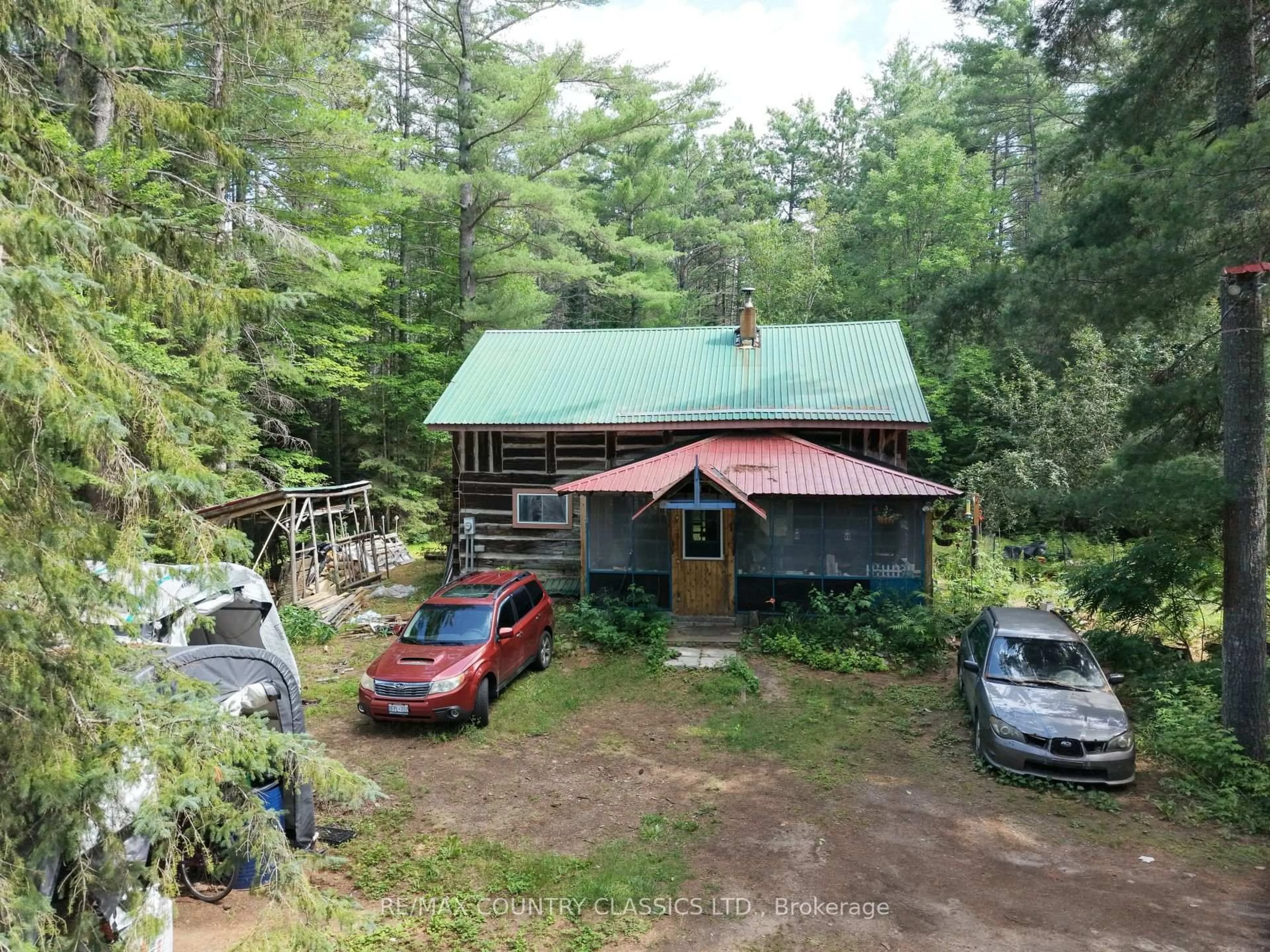 A pic from outside/outdoor area/front of a property/back of a property/a pic from drone, forest/trees view for 193 River Bend Dr, Palmer Rapids Ontario K0J 2E0