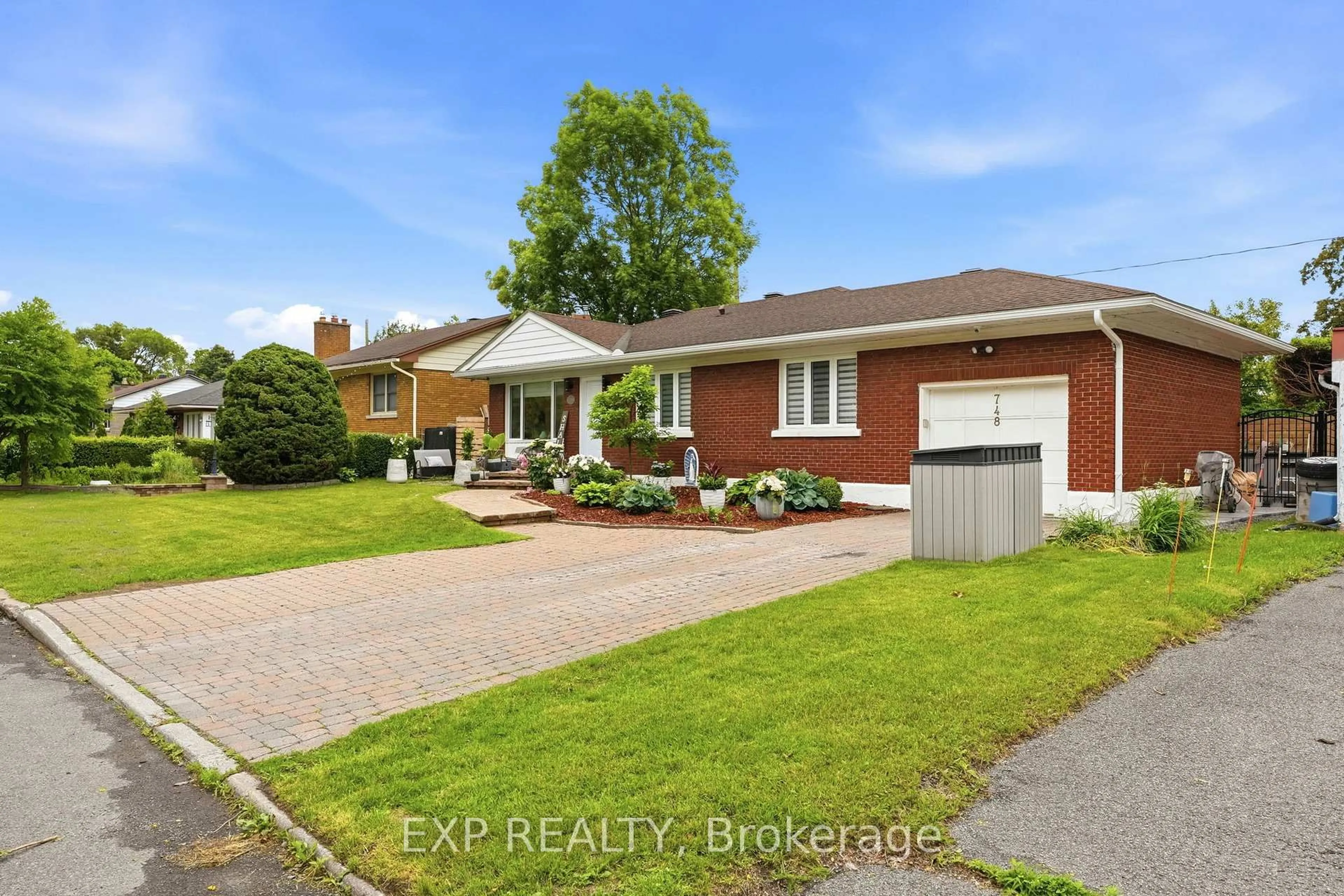 Home with brick exterior material, street for 748 WESTON Dr, Ottawa Ontario K1G 1W2