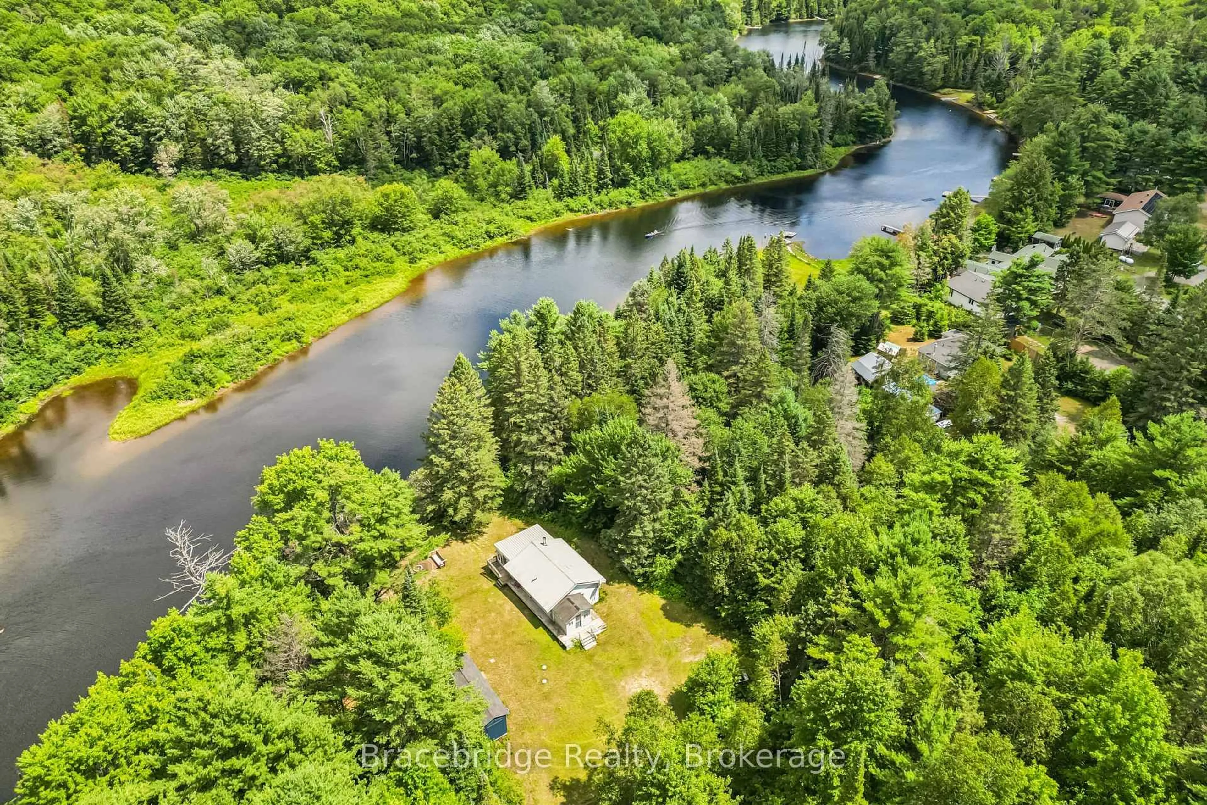 A pic from outside/outdoor area/front of a property/back of a property/a pic from drone, water/lake/river/ocean view for 1100 Colony Rd, Lake of Bays Ontario P1L 1X3