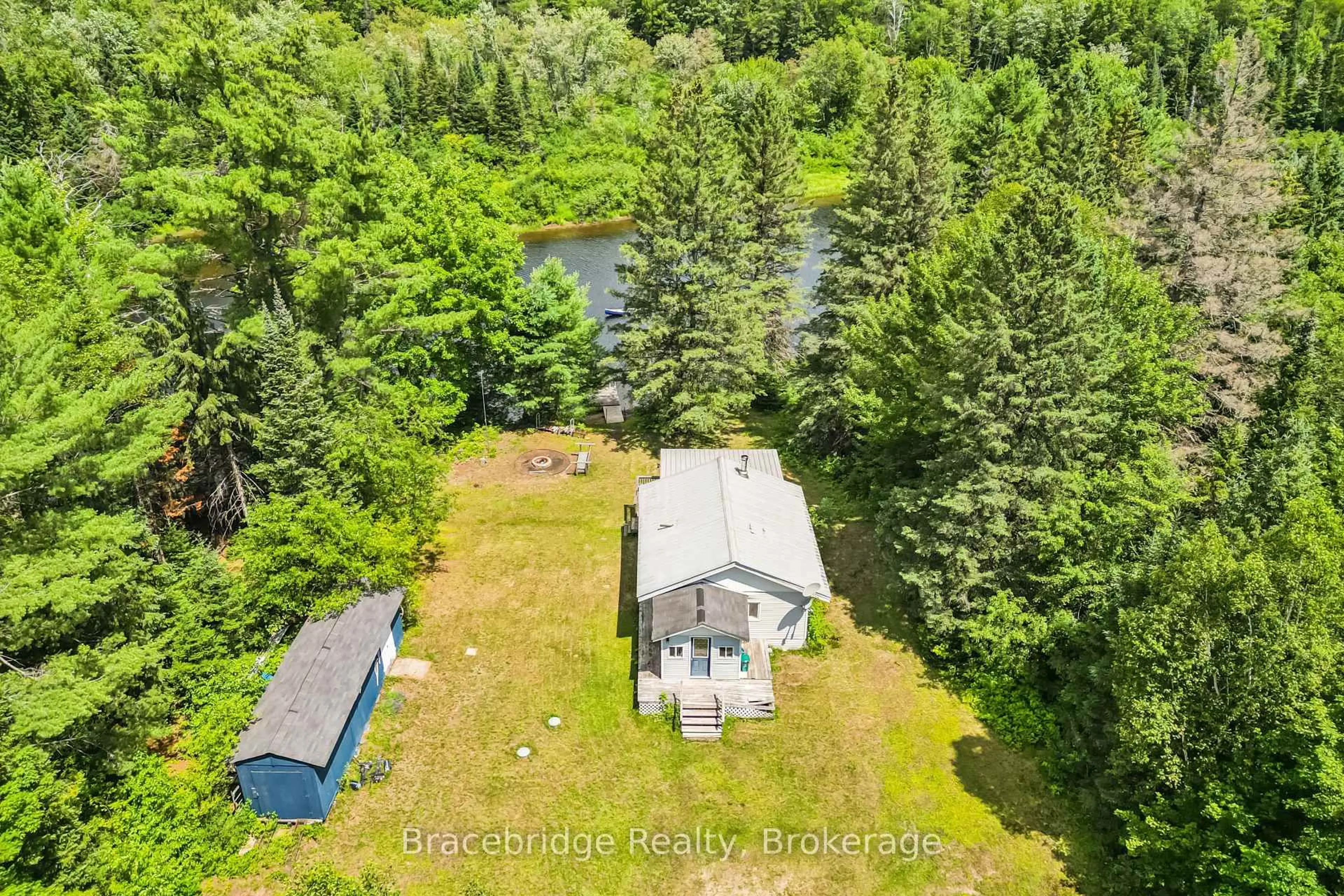A pic from outside/outdoor area/front of a property/back of a property/a pic from drone, water/lake/river/ocean view for 1100 Colony Rd, Lake of Bays Ontario P1L 1X3