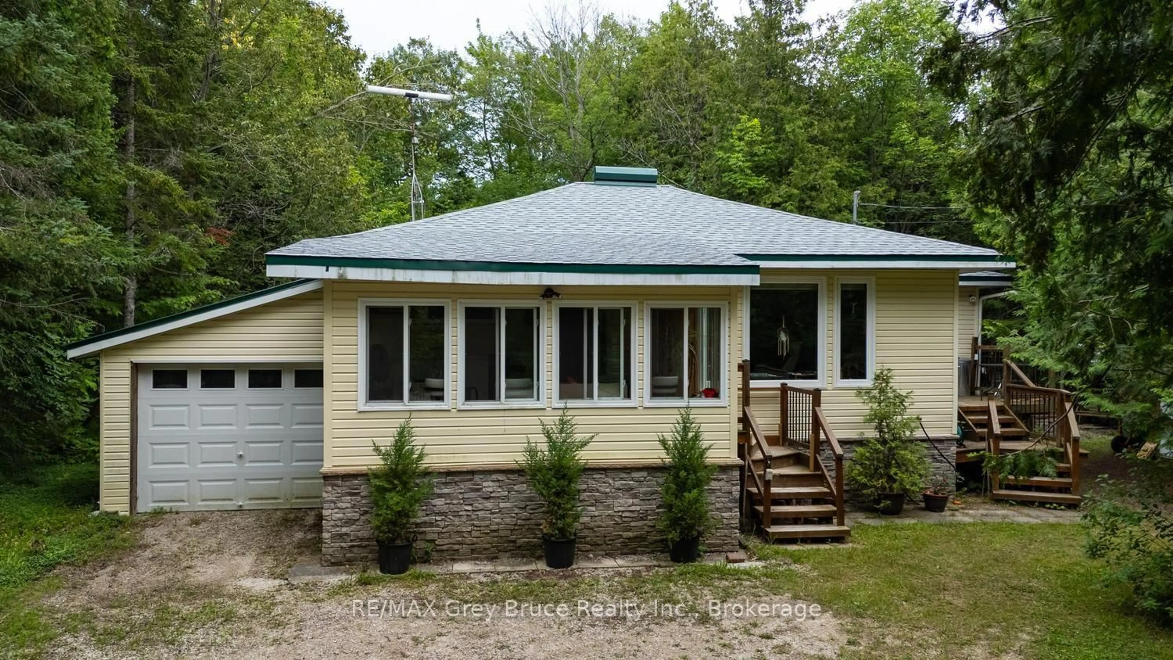Home with vinyl exterior material, building for 496 Berford Lake Rd, South Bruce Peninsula Ontario N0H 2T0