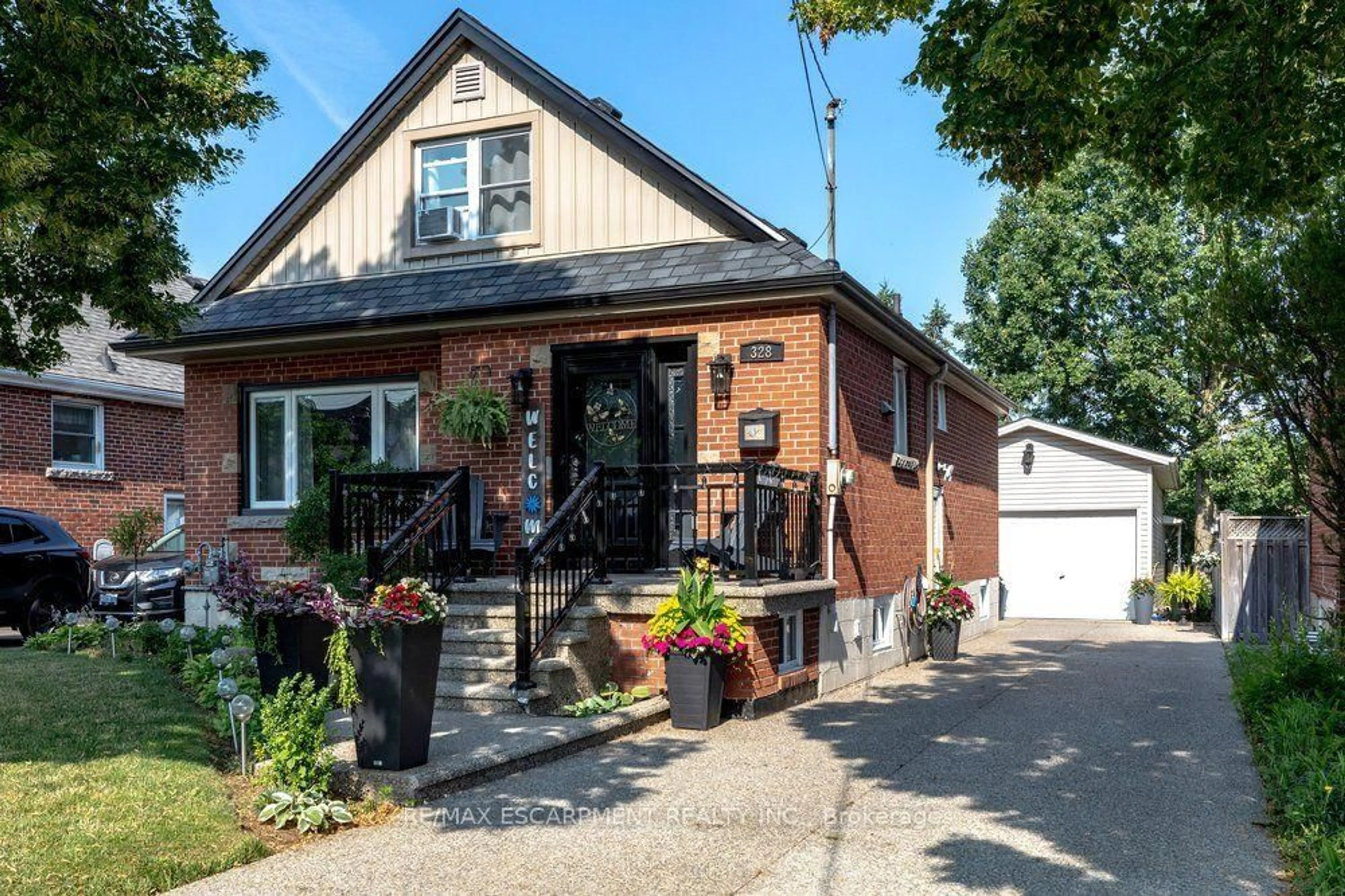 Home with brick exterior material, street for 328 East 19th St, Hamilton Ontario L9A 4S8