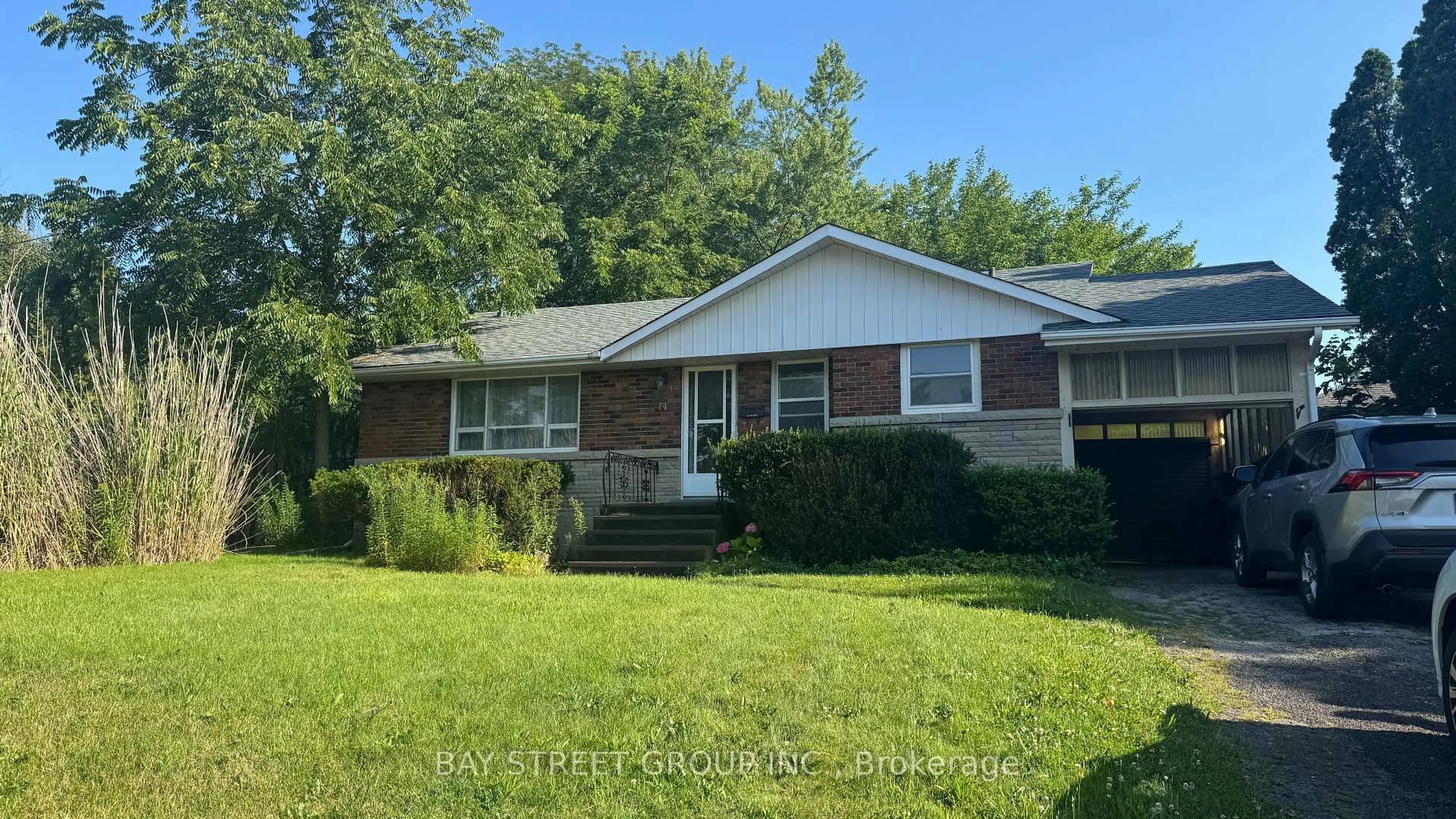 Home with brick exterior material, street for 14 Macbeth Blvd, St. Catharines Ontario L2T 2M2