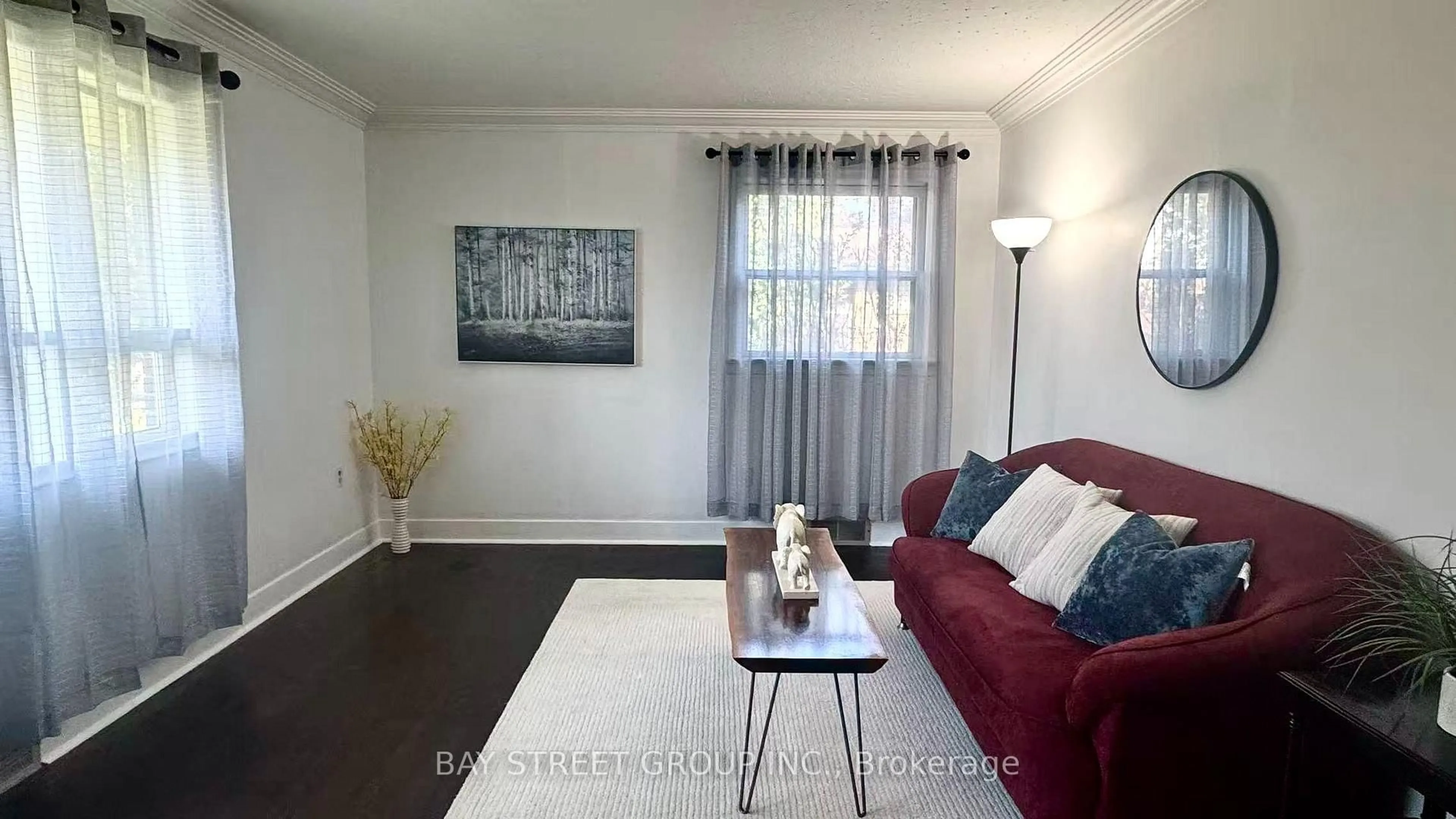 Living room with furniture, wood/laminate floor for 14 Macbeth Blvd, St. Catharines Ontario L2T 2M2
