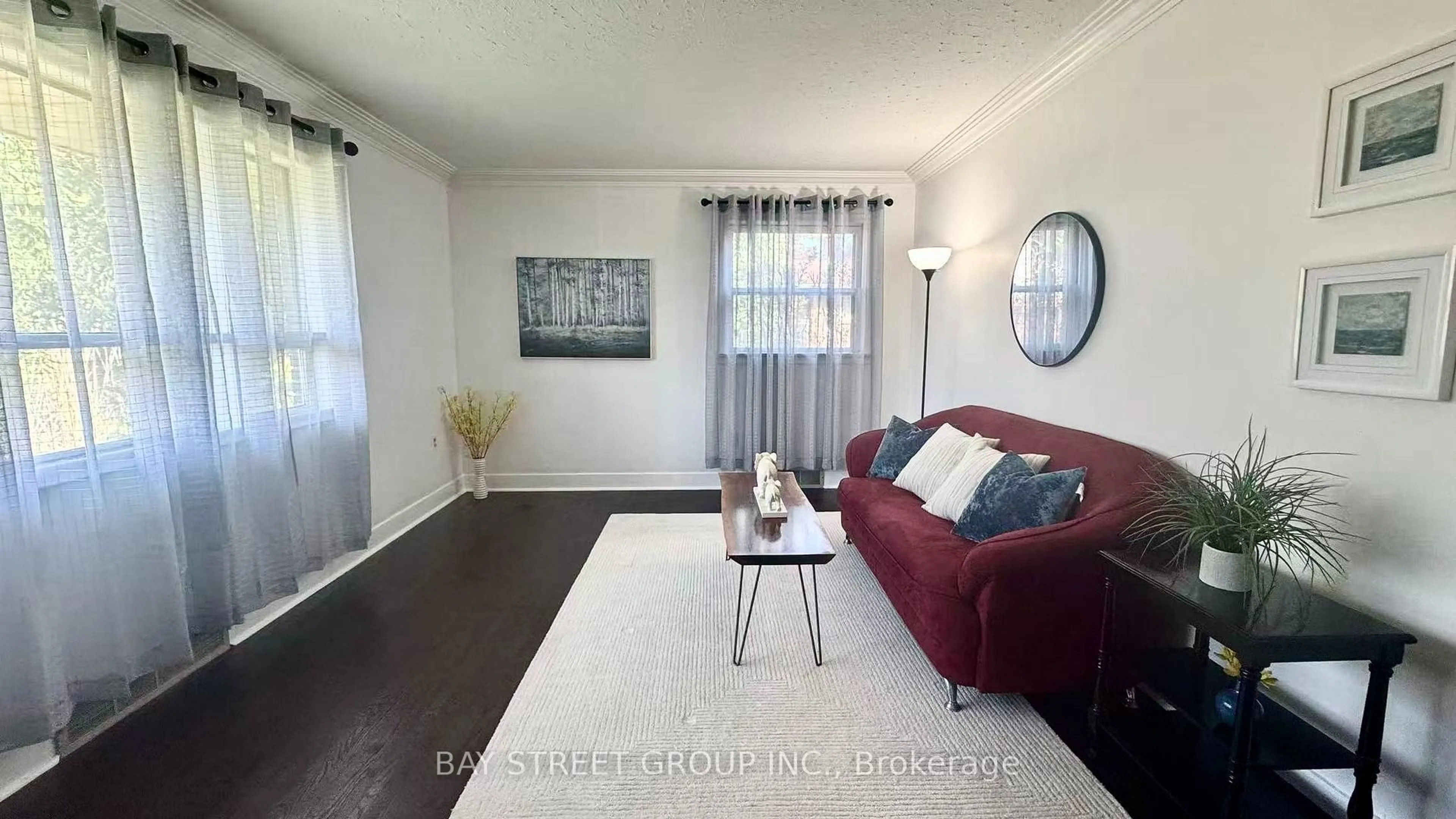 Living room with furniture, wood/laminate floor for 14 Macbeth Blvd, St. Catharines Ontario L2T 2M2