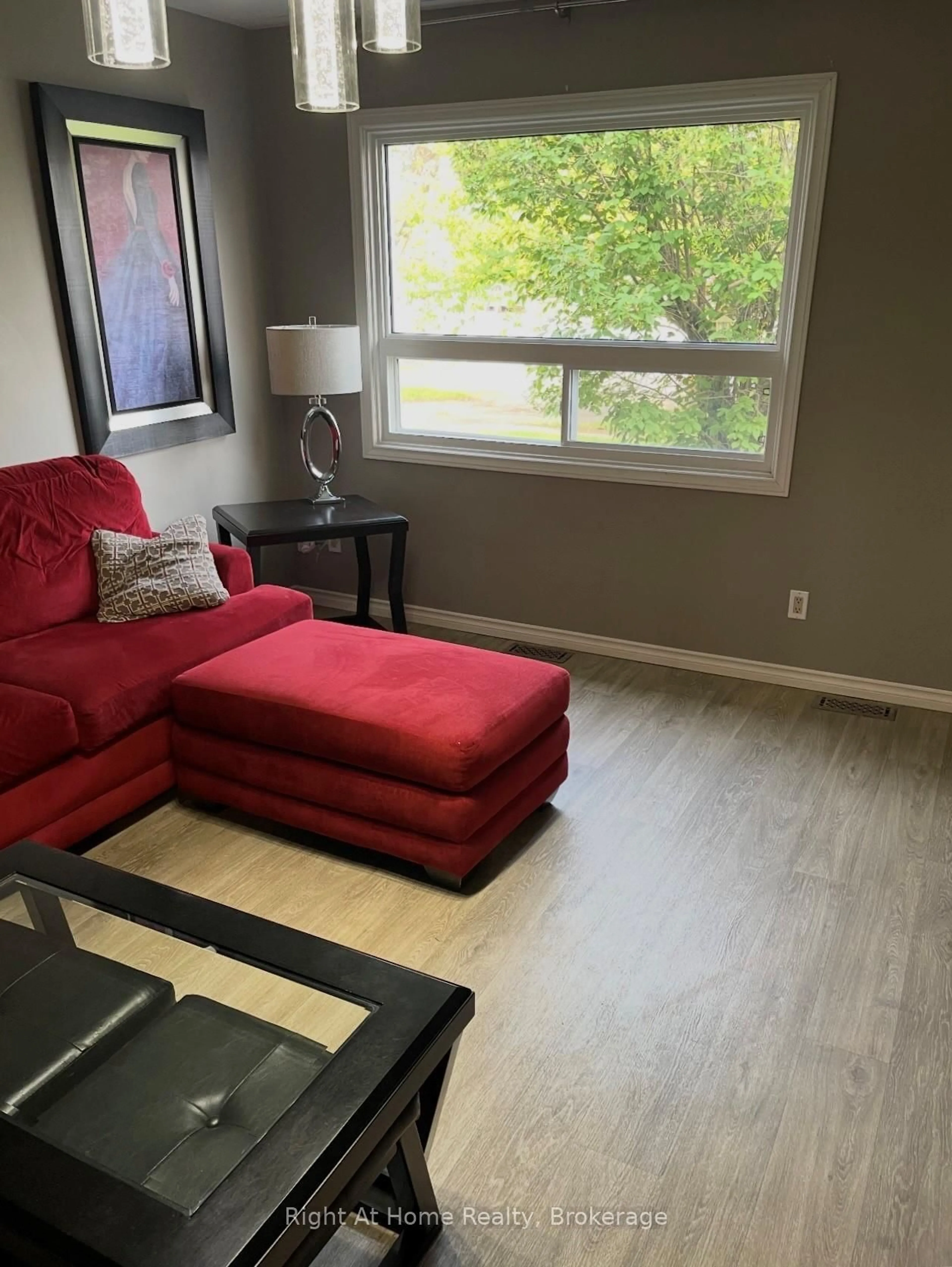 Living room with furniture, wood/laminate floor for 323A WENTWORTH Cres, Thunder Bay Ontario P7A 7S7