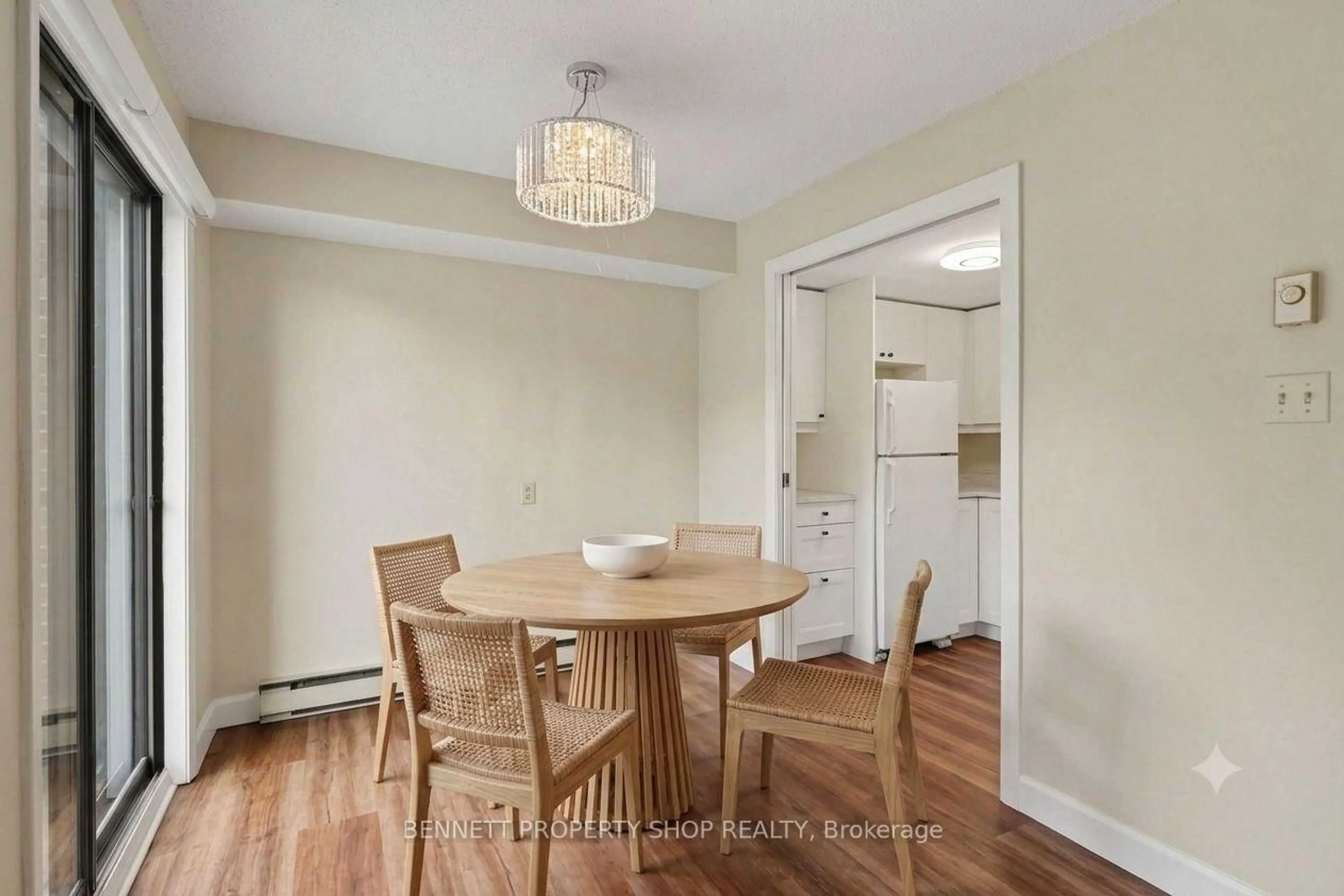 Dining room, wood/laminate floor for 100 Rideau Terr #3B, Ottawa Ontario K1M 0Z2