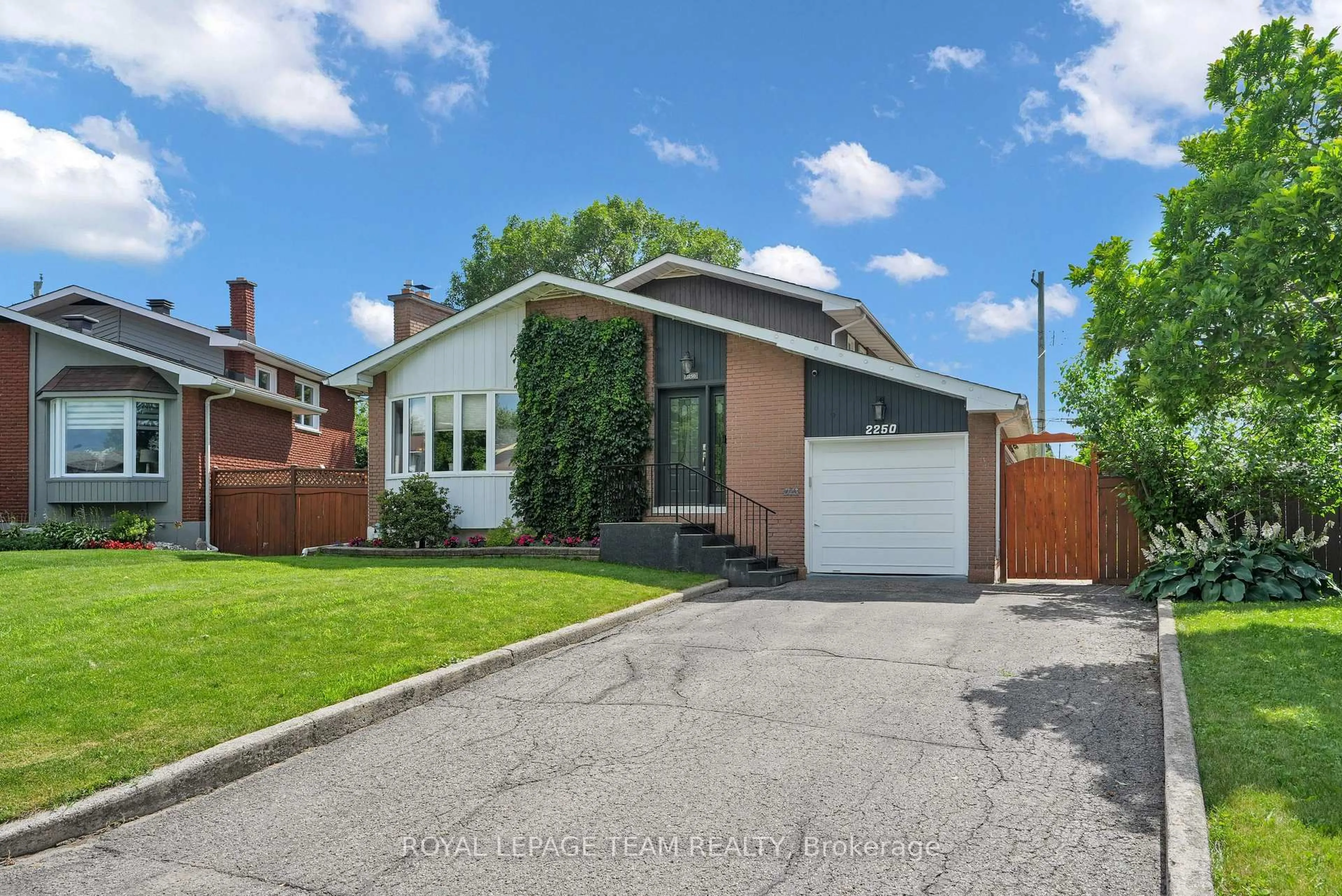 Home with brick exterior material, street for 2250 Urbandale Dr, Ottawa Ontario K1G 3G6