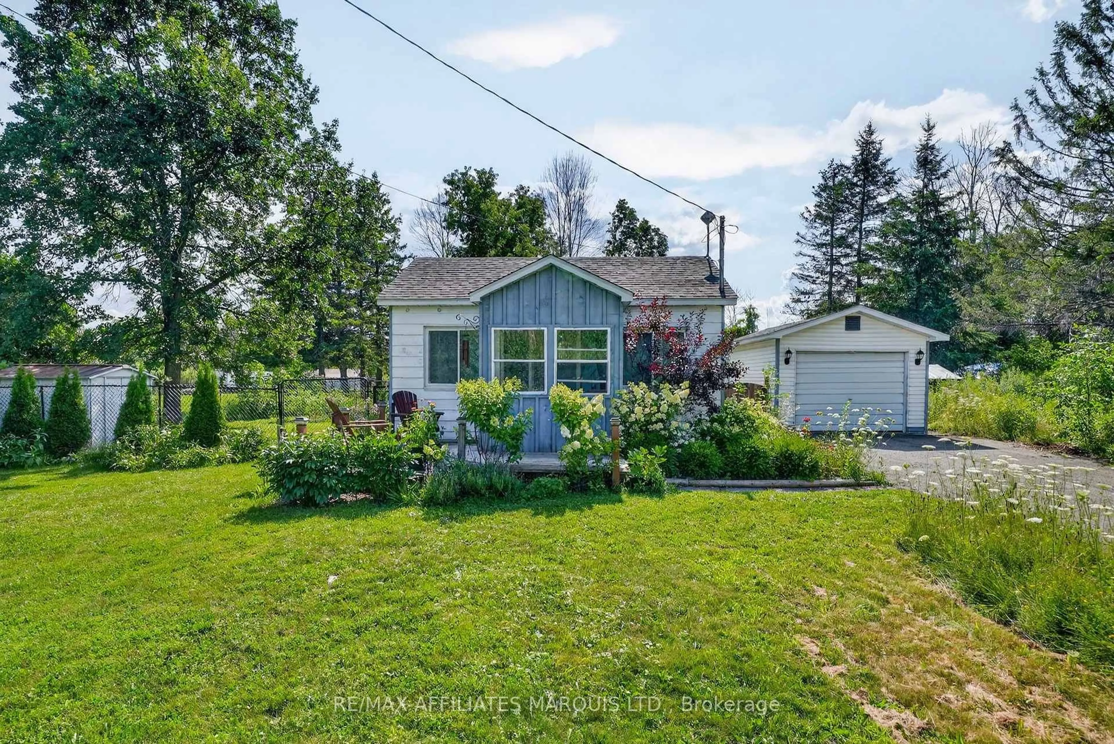 A pic from outside/outdoor area/front of a property/back of a property/a pic from drone, street for 5414 Farran's Point Rd Rd, South Stormont Ontario K0C 1M0