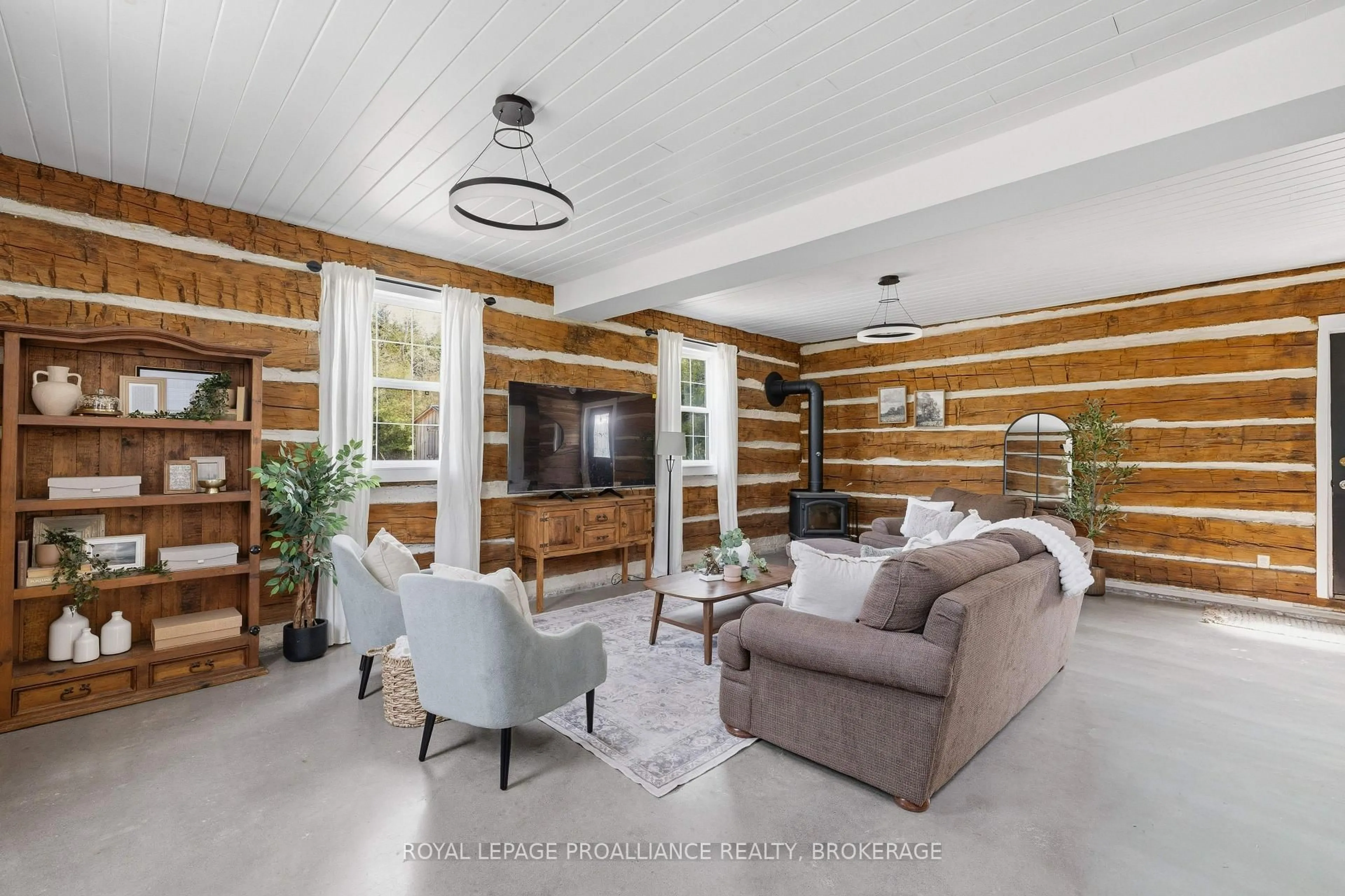 Living room with furniture, wood/laminate floor for 418 Highway 32, Front of Leeds & Seeleys Bay Ontario K7G 2V3