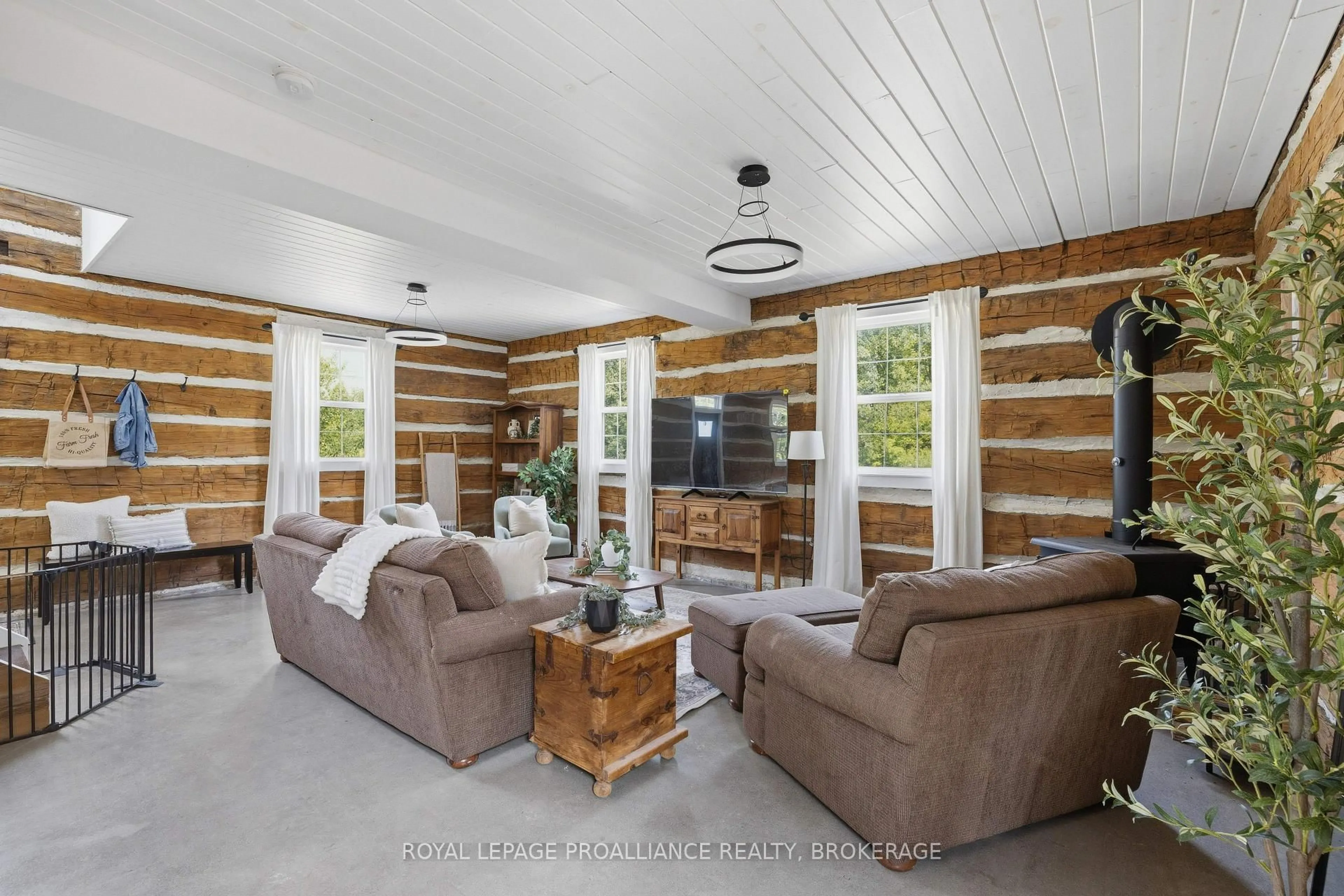 Living room with furniture, wood/laminate floor for 418 Highway 32, Front of Leeds & Seeleys Bay Ontario K7G 2V3