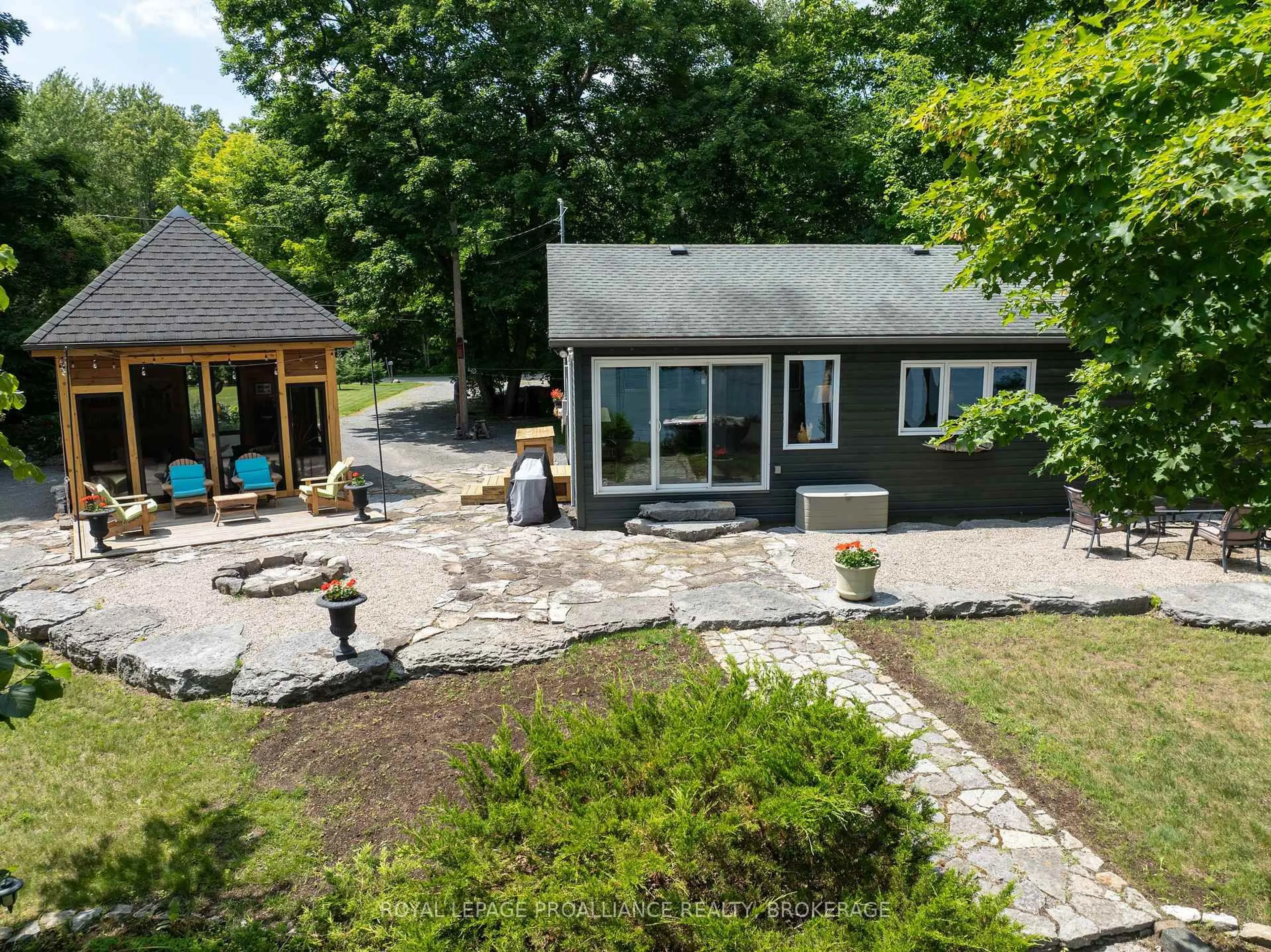 A pic from outside/outdoor area/front of a property/back of a property/a pic from drone, unknown for 1418 Wagner Rd, Sharbot Lake Ontario K0H 2P0