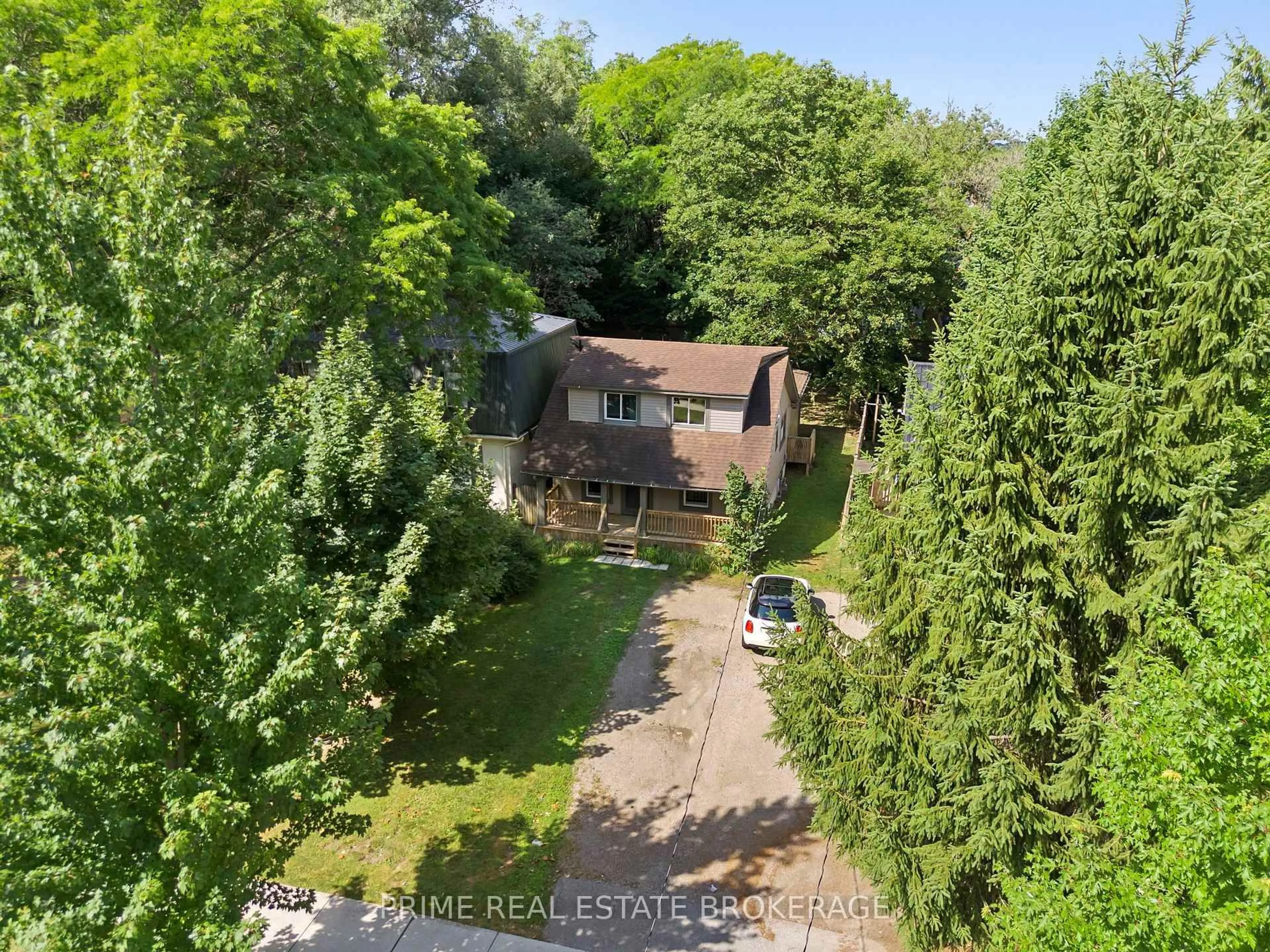 A pic from outside/outdoor area/front of a property/back of a property/a pic from drone, forest/trees view for 457 St George St, London East Ontario N6A 3B6